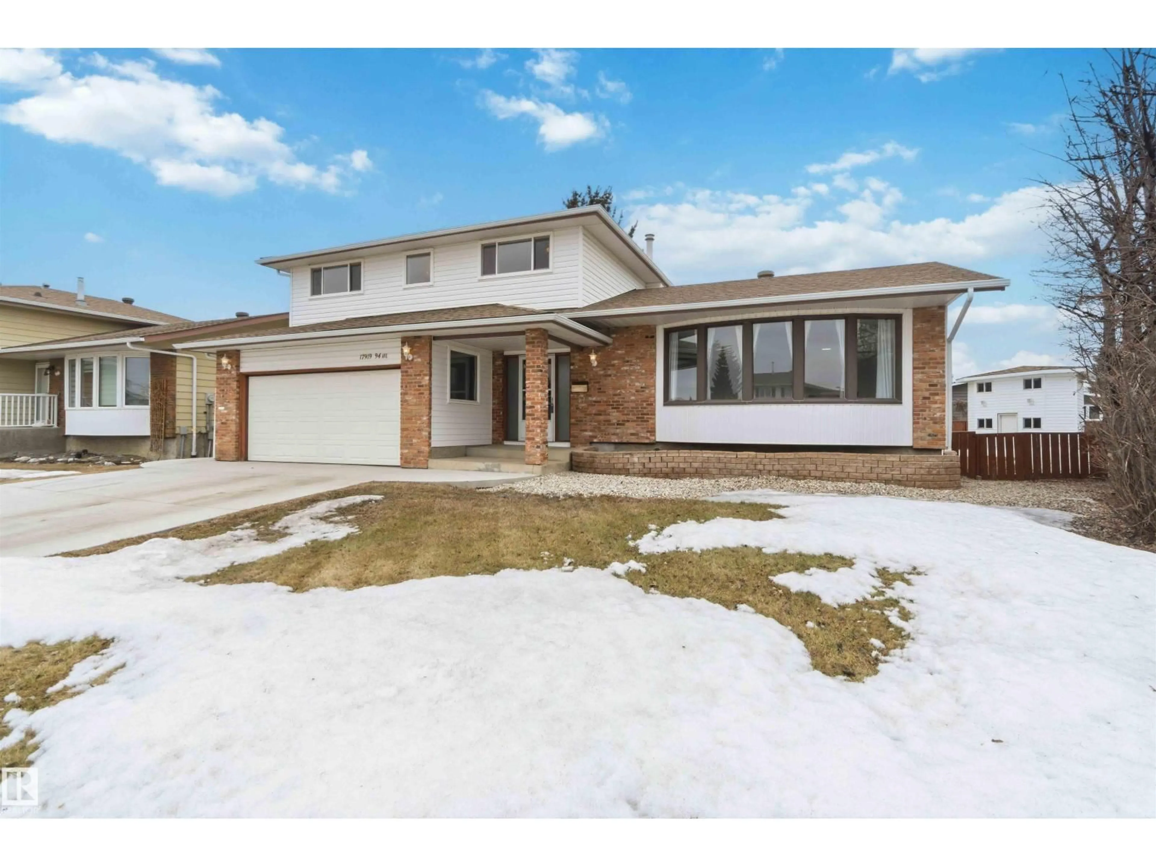 Home with brick exterior material, street for 17919 94 AV, Edmonton Alberta T5T1Y3