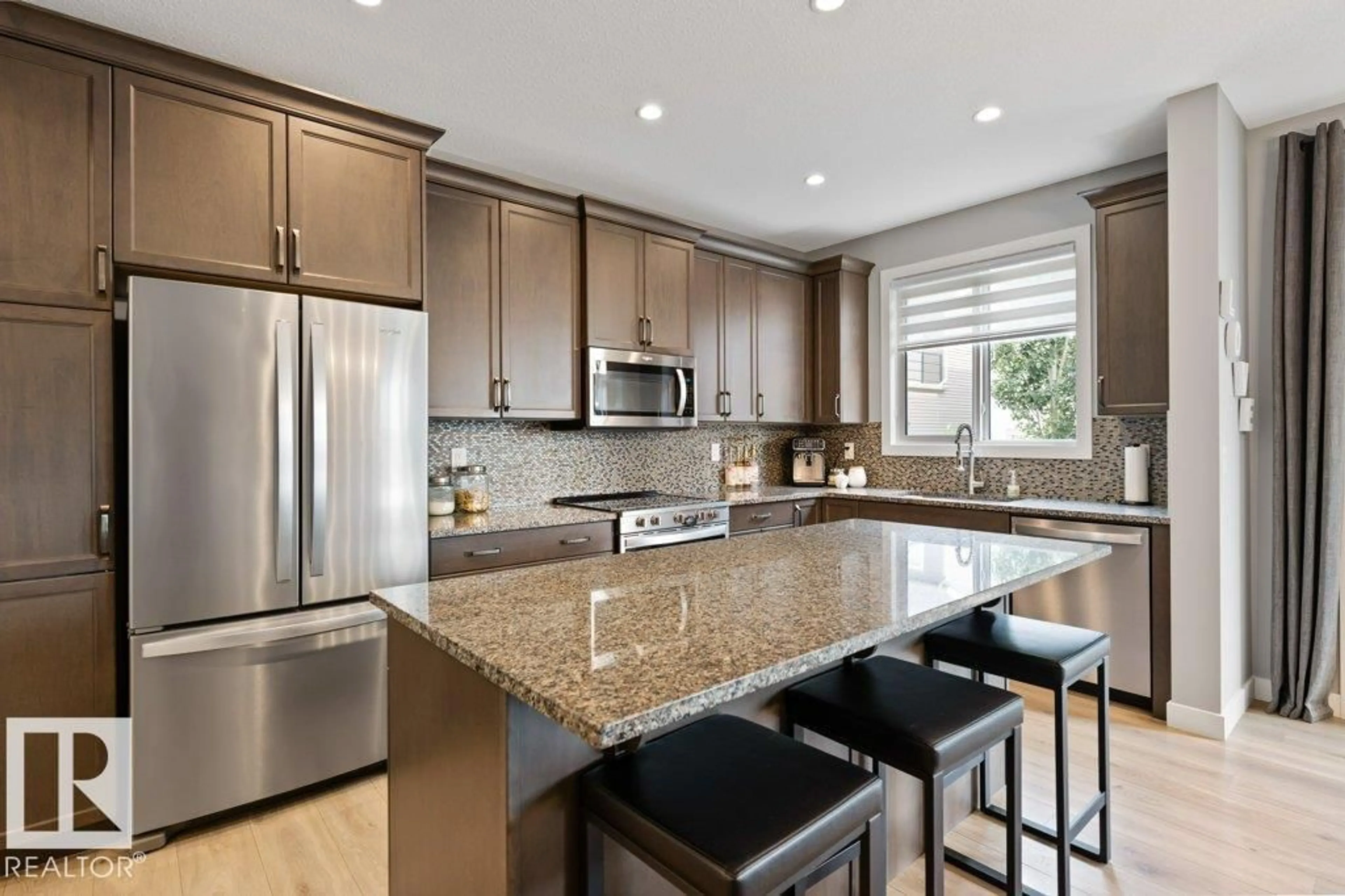 Open concept kitchen, ceramic/tile floor for NW - 20008 18 AV, Edmonton Alberta T6M0Y1