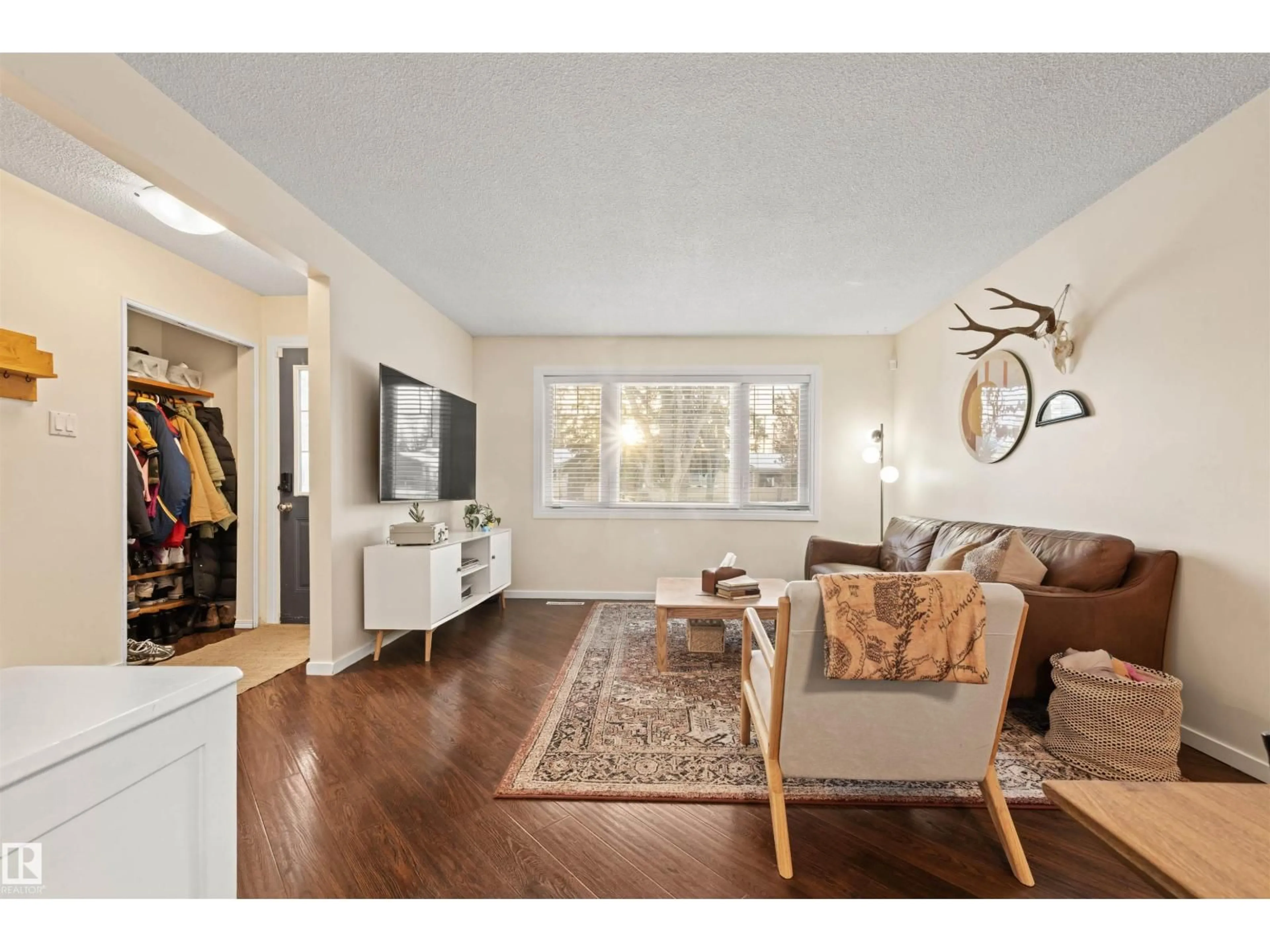 Living room with furniture, wood/laminate floor for 3 SORREL CR, St. Albert Alberta T8N0K4