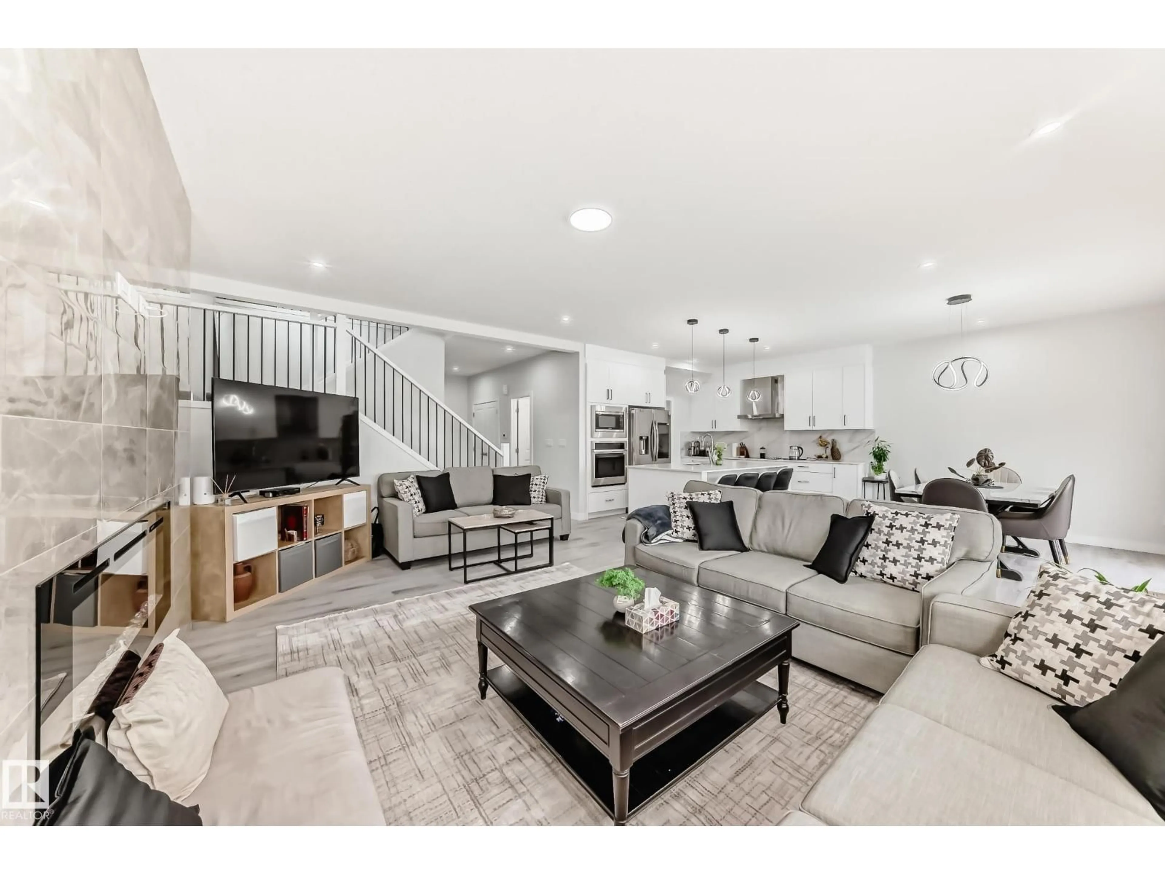 Living room with furniture, unknown for 4509 170A AV, Edmonton Alberta T5Y4C9