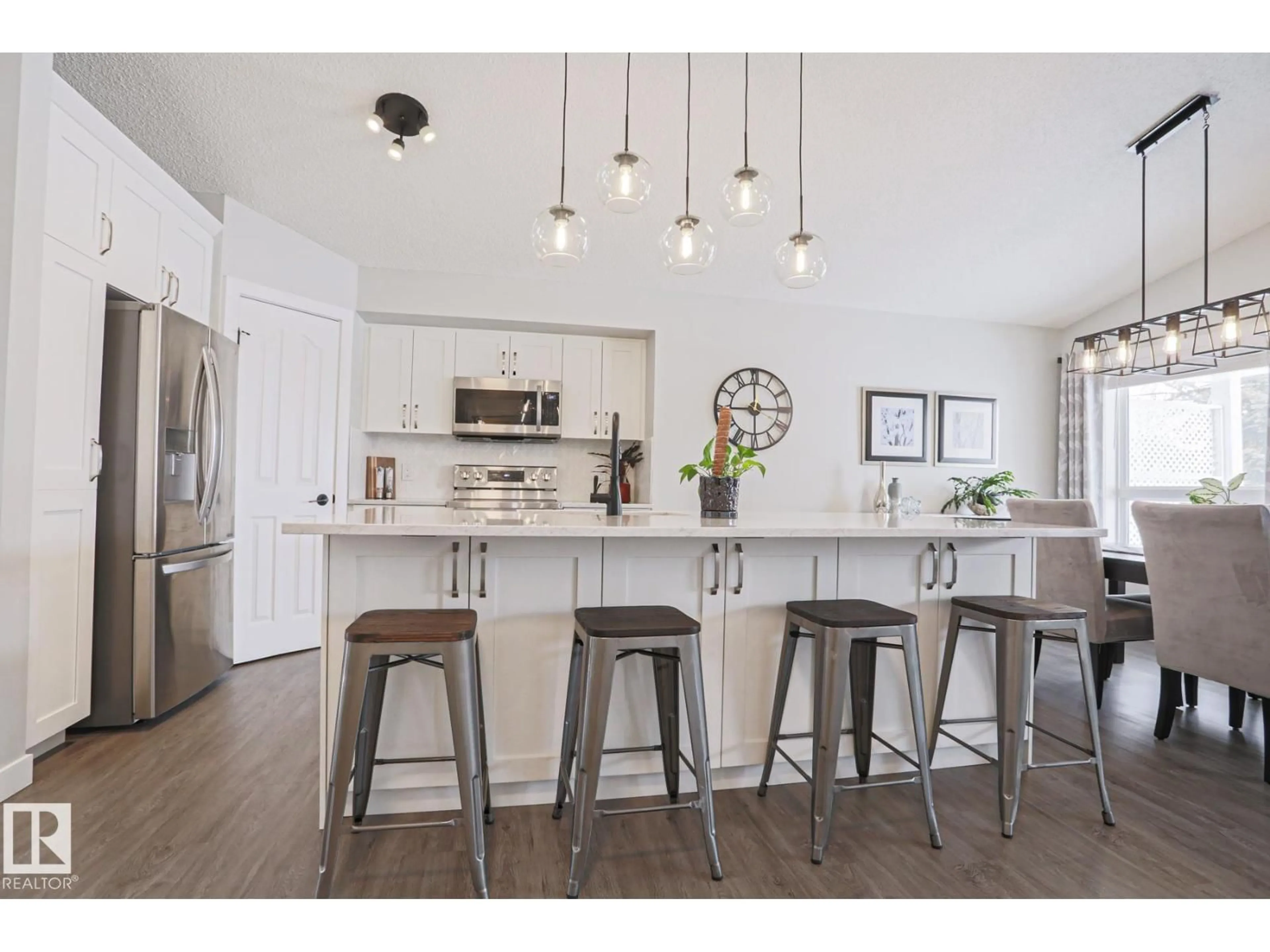 Open concept kitchen, wood/laminate floor for 53 NEWPORT CR, St. Albert Alberta T8N6Y9