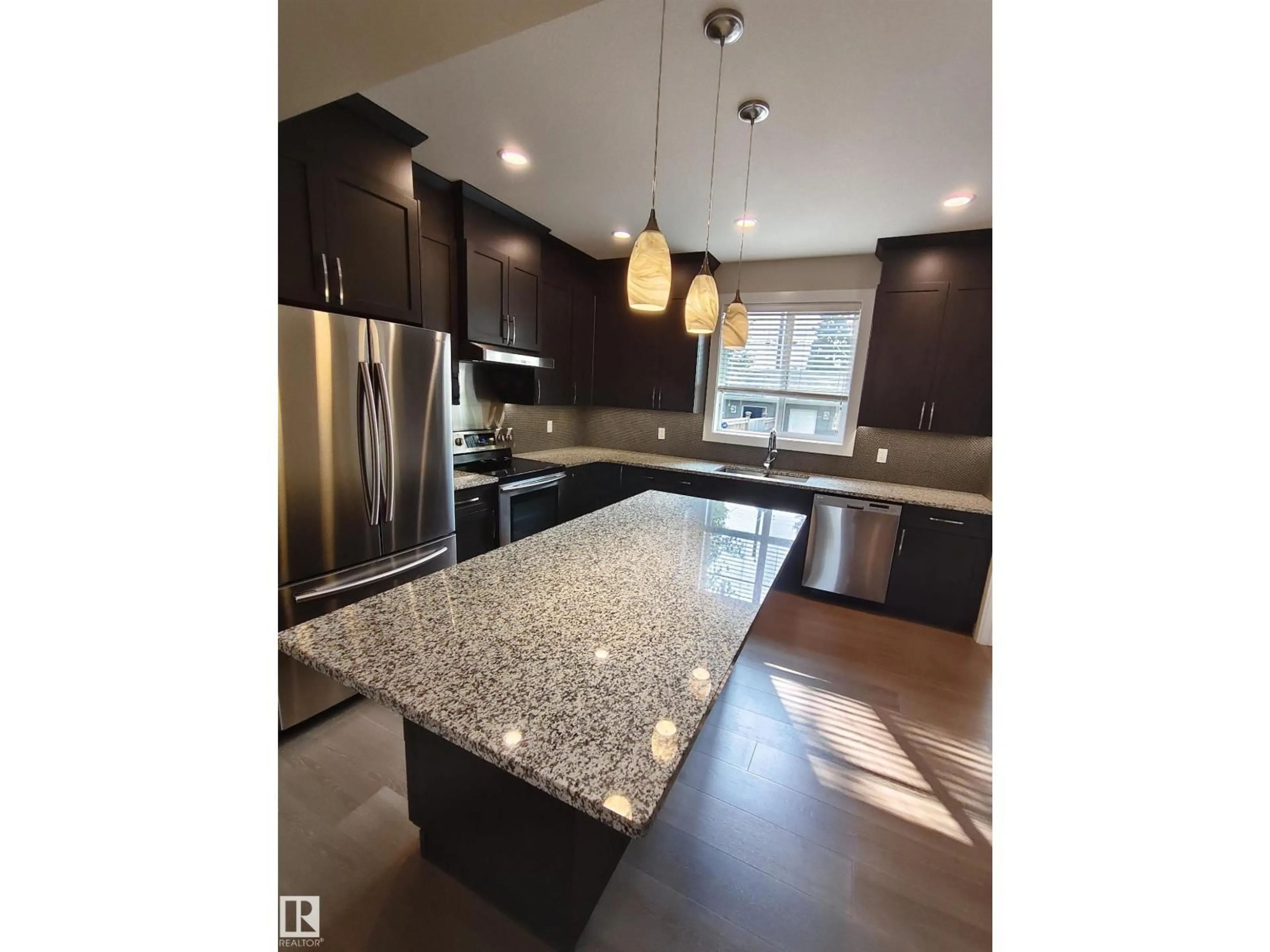 Open concept kitchen, unknown for 9527 75 AV, Edmonton Alberta T6E1H5
