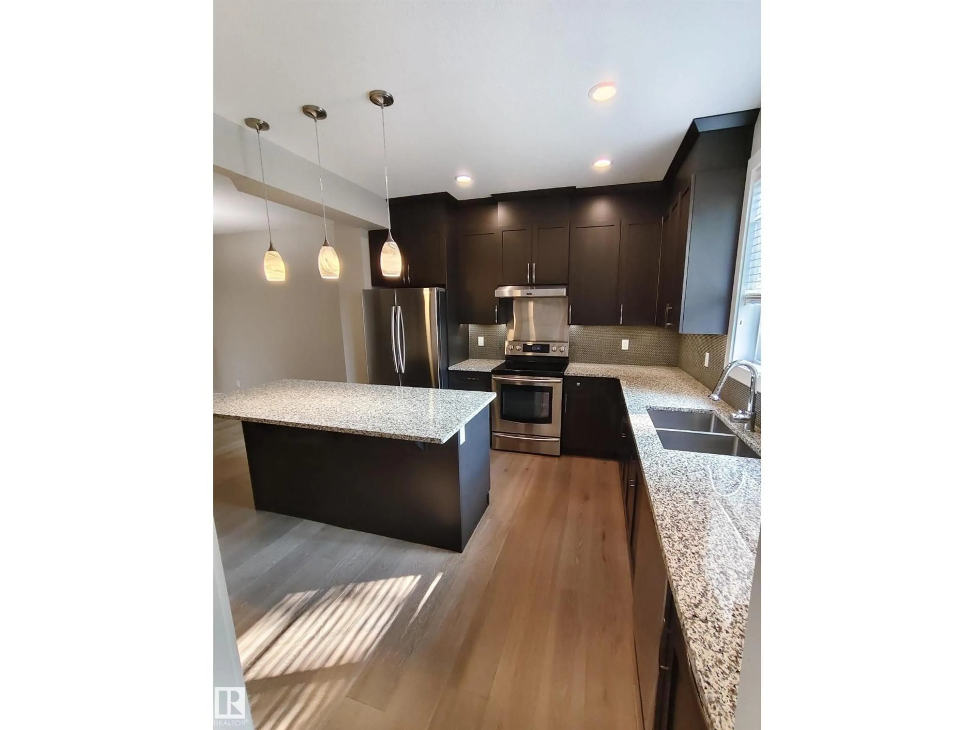 Open concept kitchen, unknown for 9527 75 AV, Edmonton Alberta T6E1H5