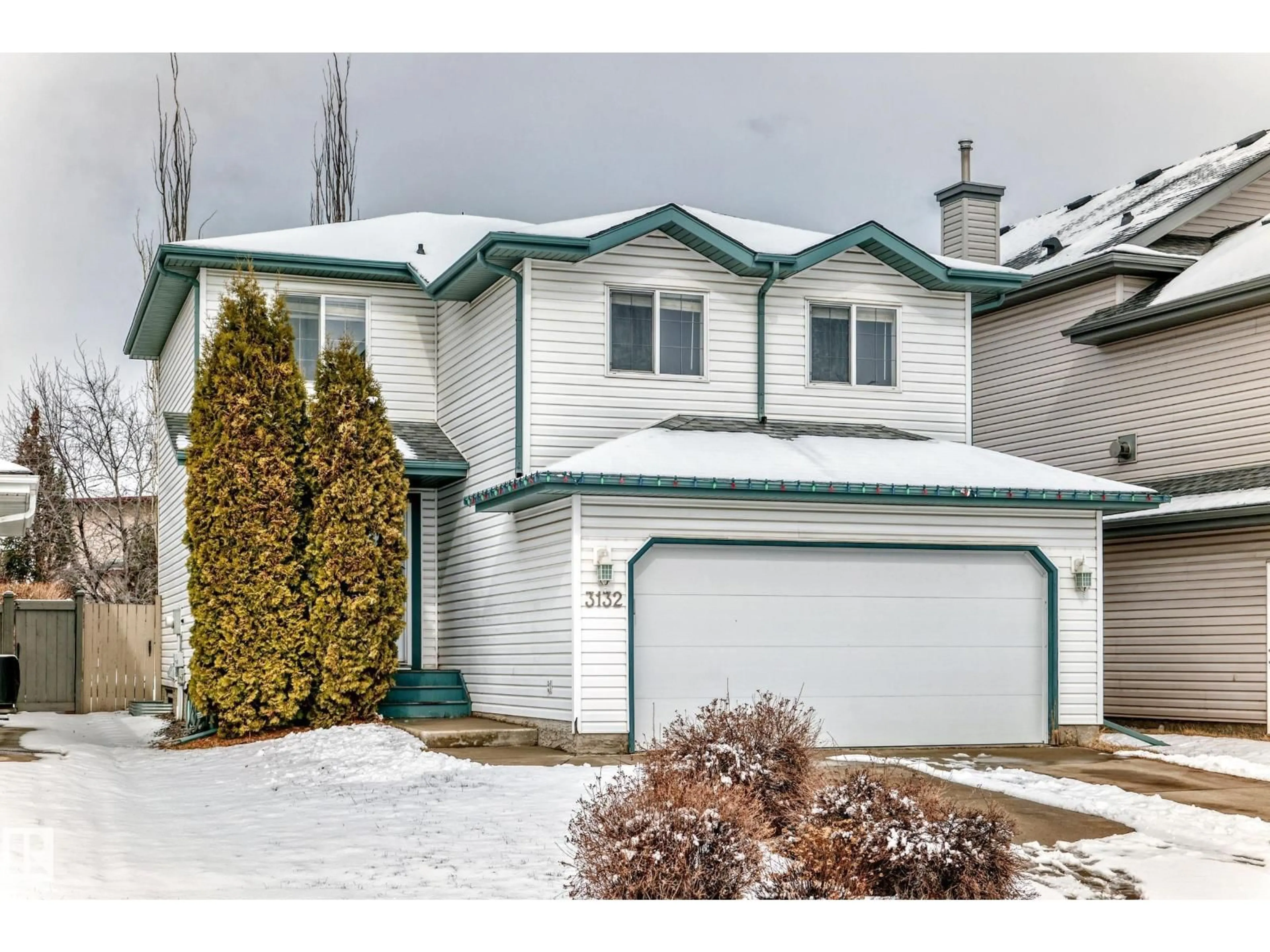 Home with vinyl exterior material, street for NW - 3132 33 AV, Edmonton Alberta T6T1X2