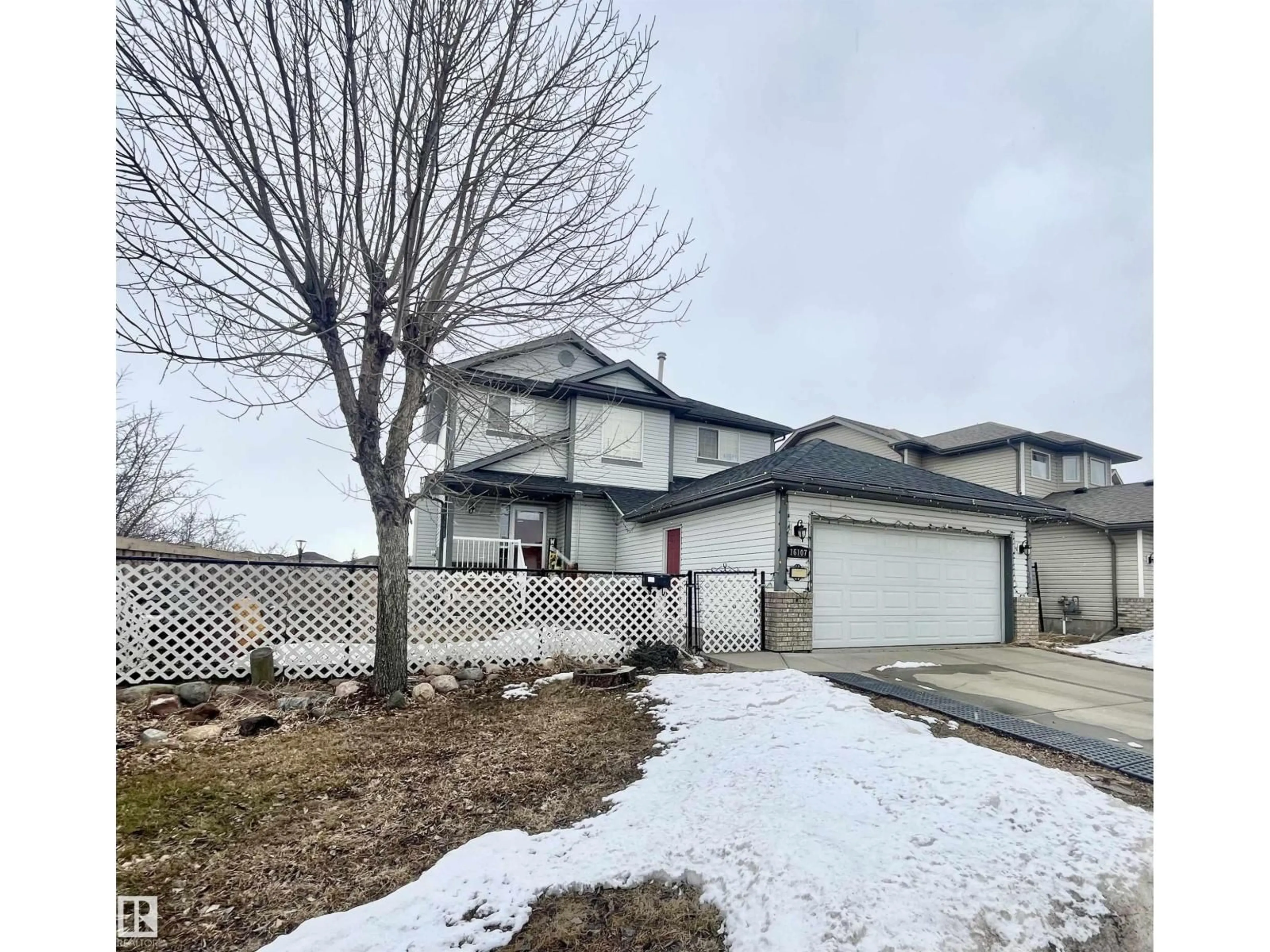 A pic from outside/outdoor area/front of a property/back of a property/a pic from drone, street for 16107 92 ST, Edmonton Alberta T5Z3N1