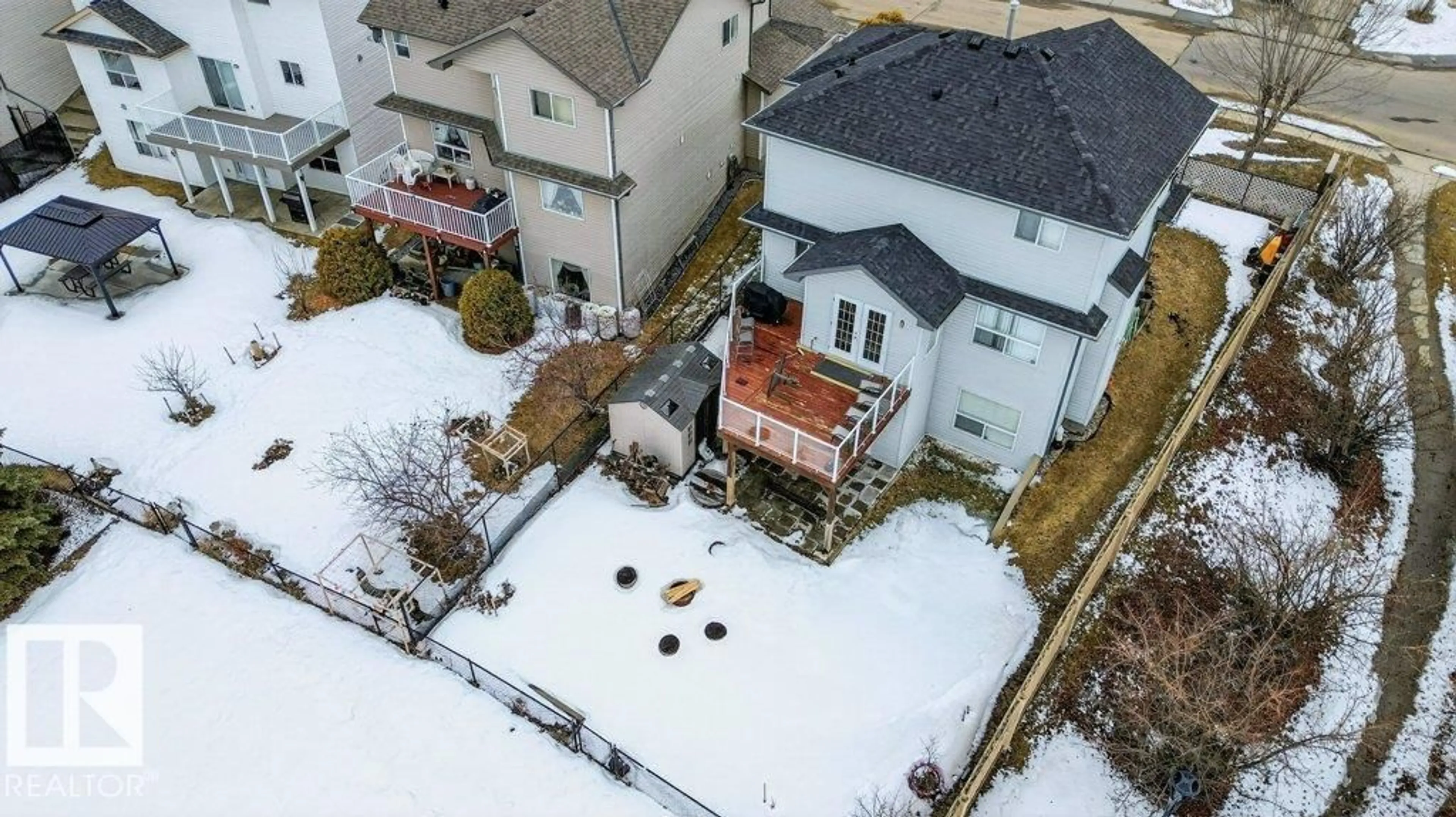 A pic from outside/outdoor area/front of a property/back of a property/a pic from drone, street for 16107 92 ST, Edmonton Alberta T5Z3N1