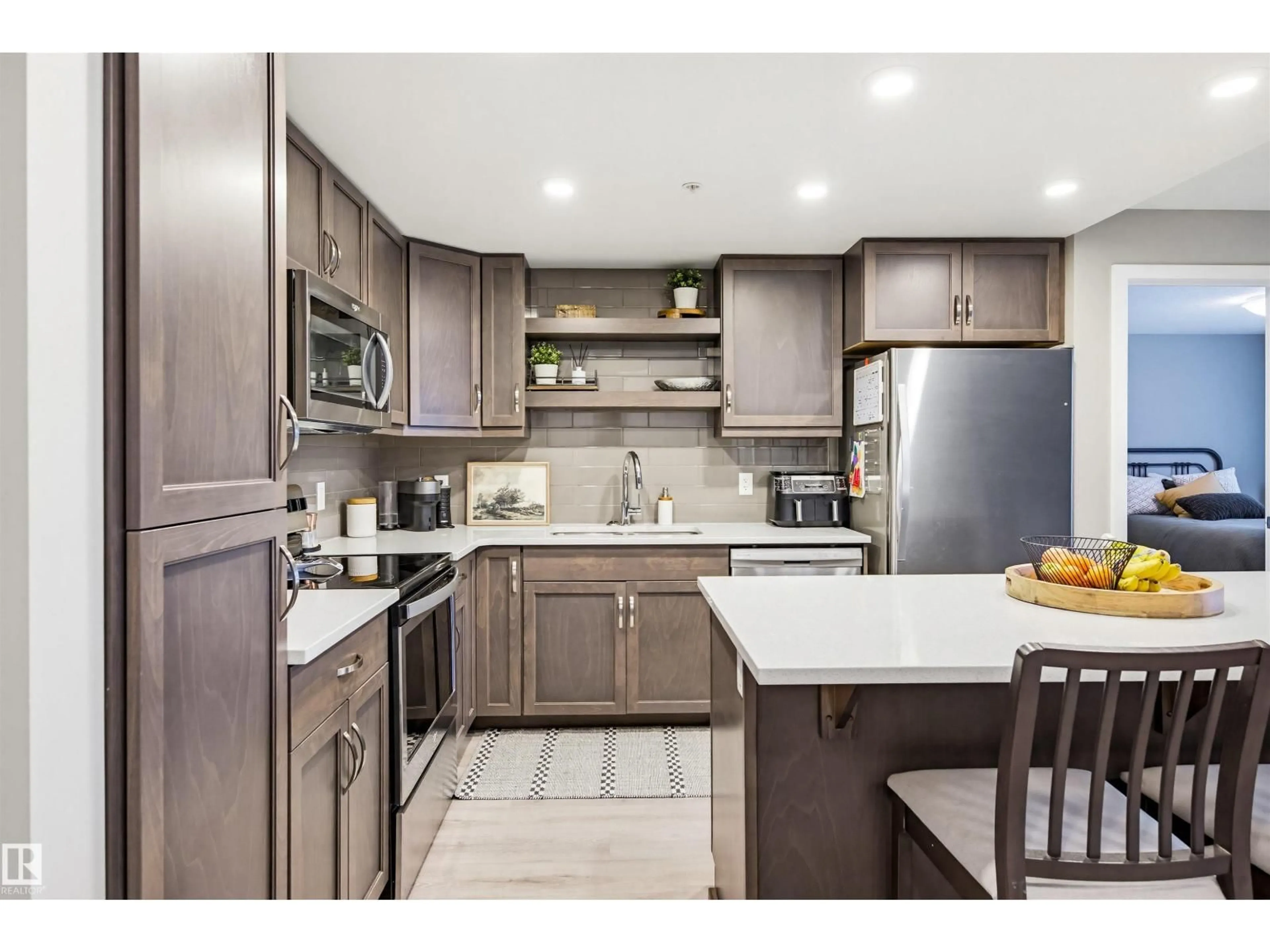 Open concept kitchen, ceramic/tile floor for 5504 - 232 SCHONSEE DR, Edmonton Alberta T5Z0N9