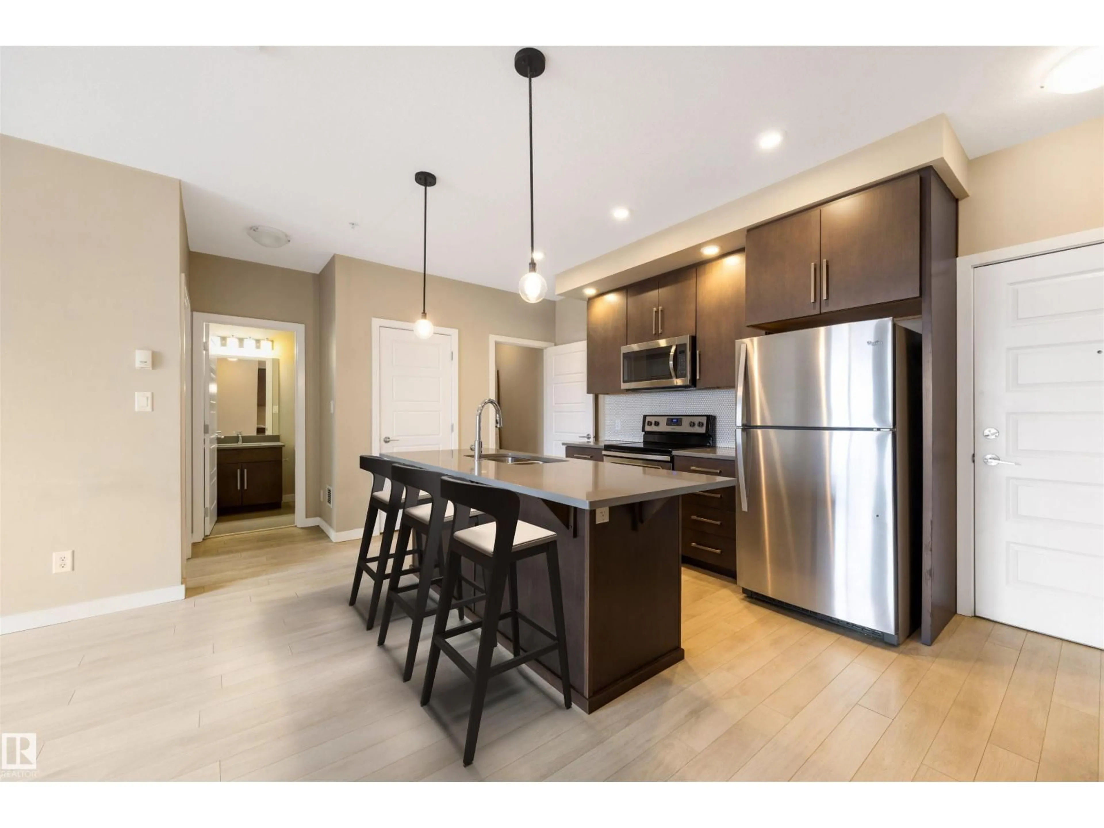 Open concept kitchen, unknown for #434 - 1008 ROSENTHAL BV, Edmonton Alberta T5T7J4