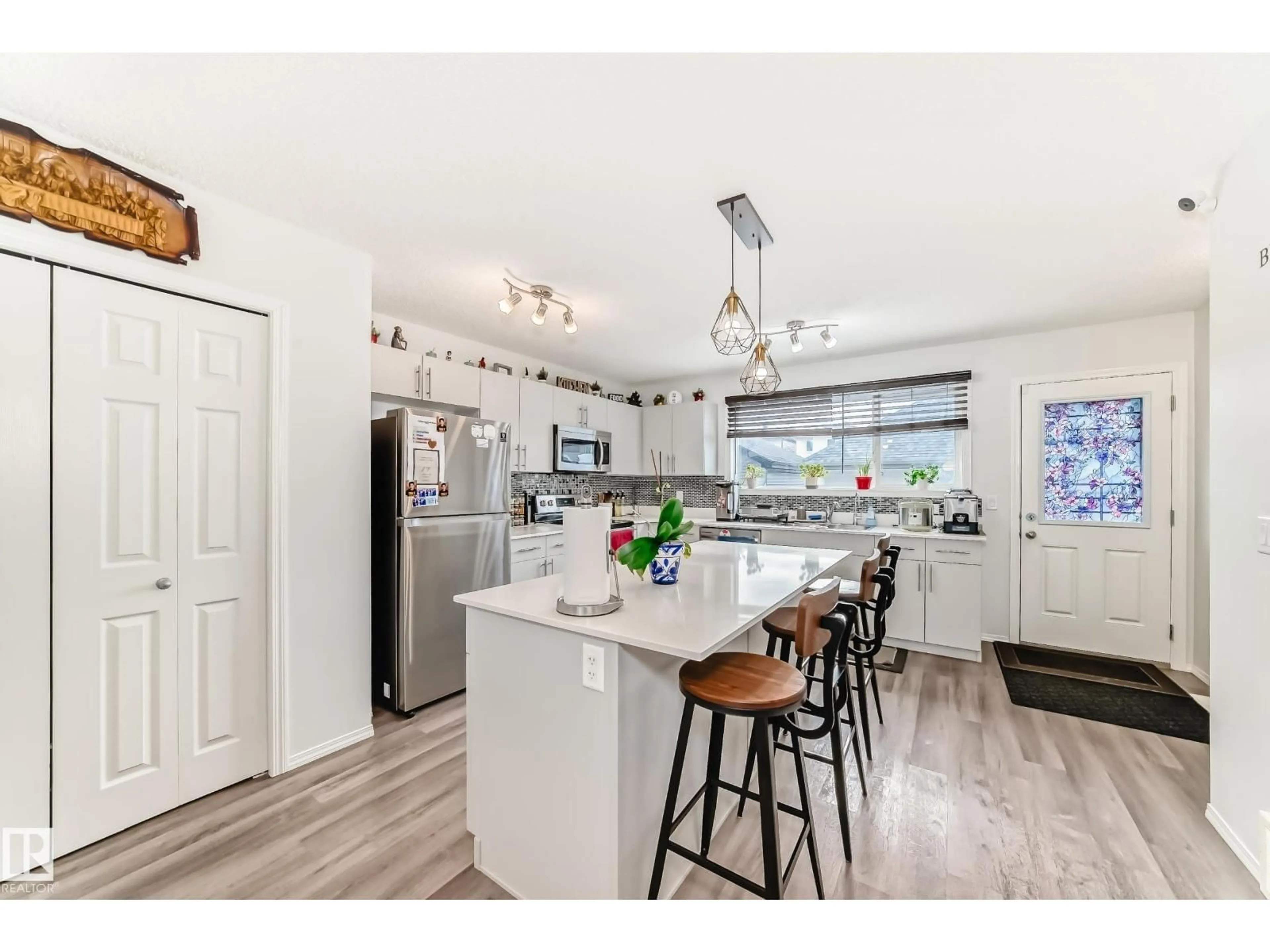 Open concept kitchen, unknown for 19303 27 AV, Edmonton Alberta T6M1K9