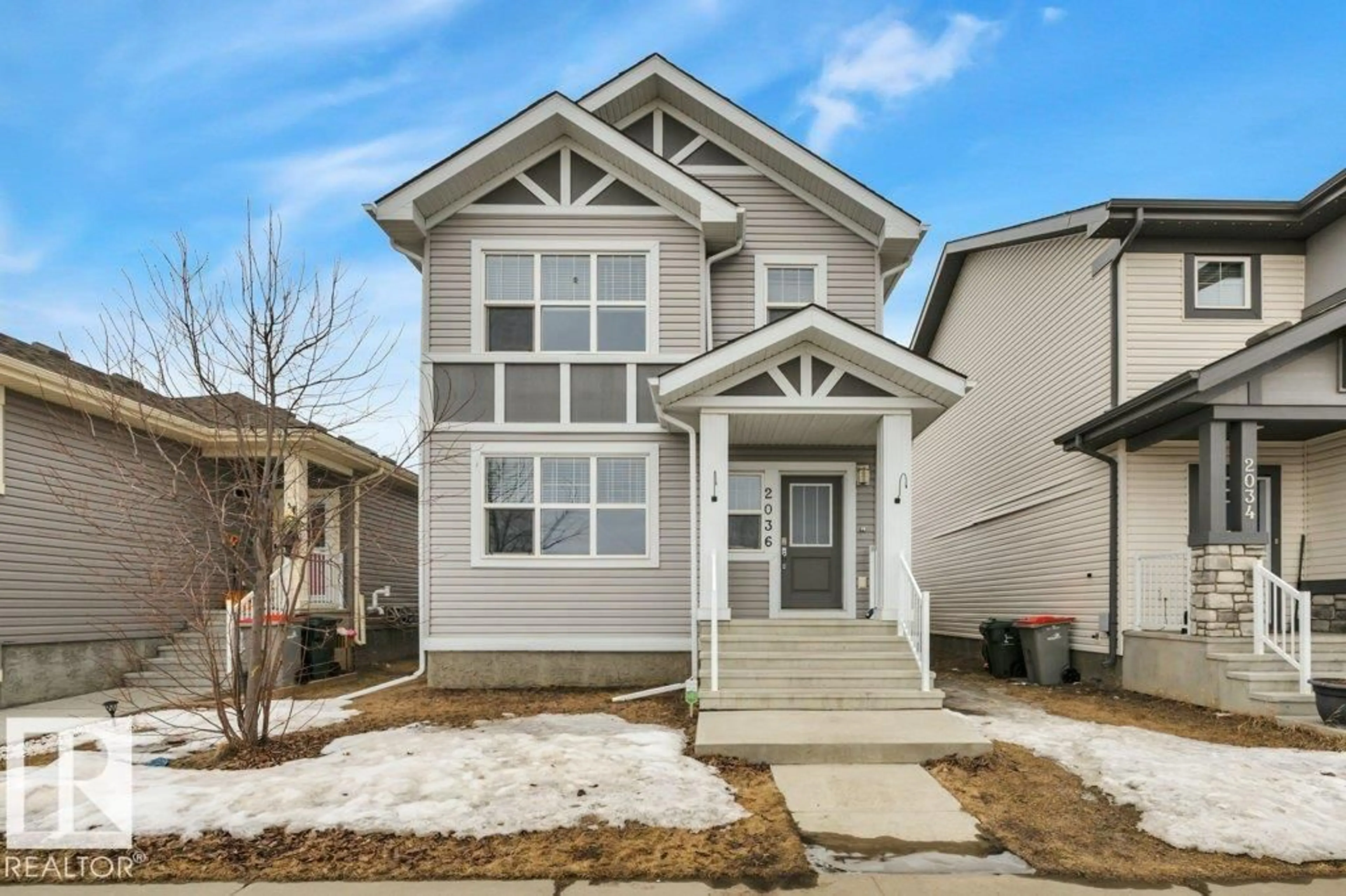 Home with vinyl exterior material, street for 2036 SOUTH CREEK DR, Stony Plain Alberta T7Z0J8