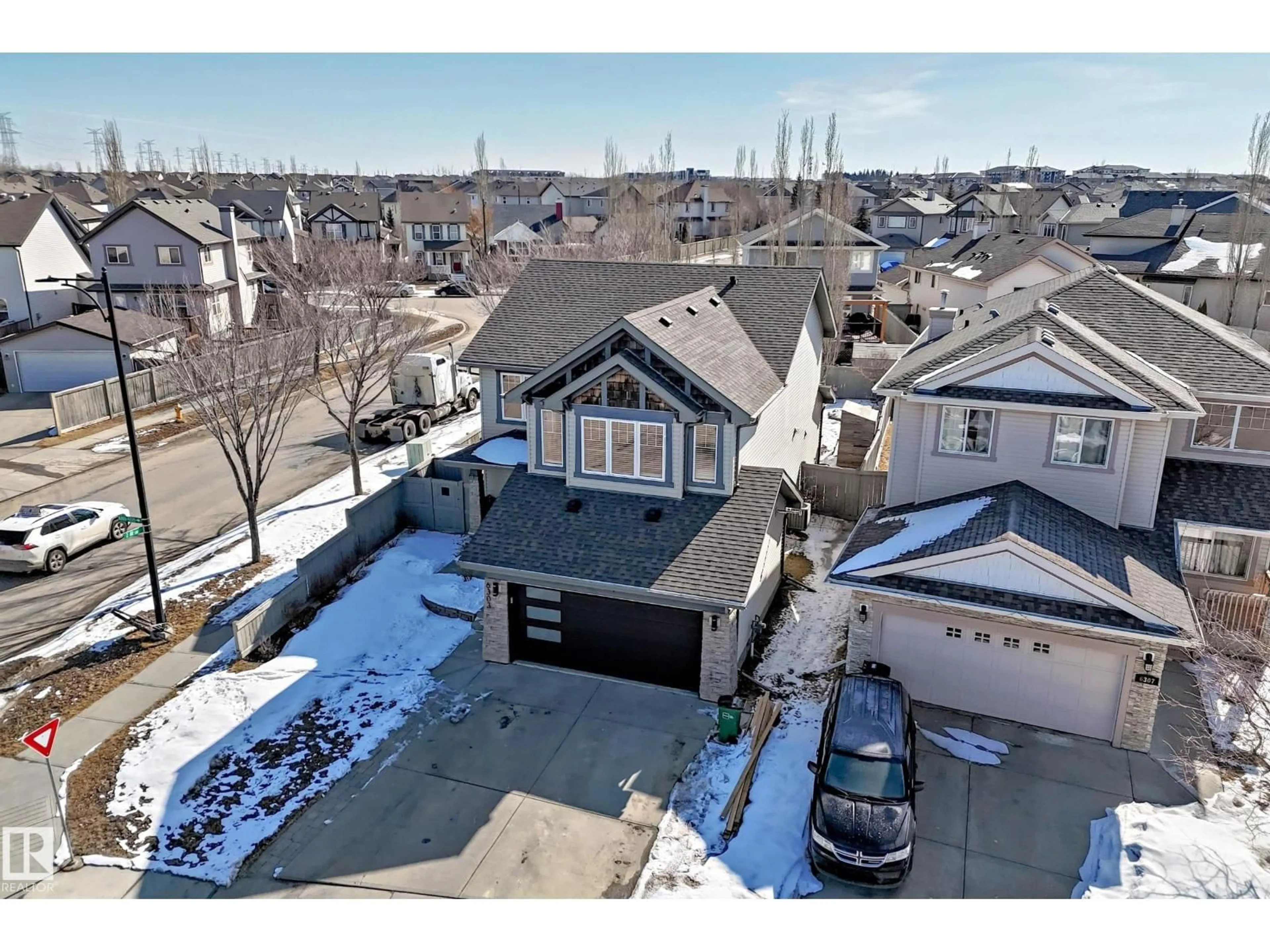A pic from outside/outdoor area/front of a property/back of a property/a pic from drone, street for SW - 6303 2 AV, Edmonton Alberta T6X0B9