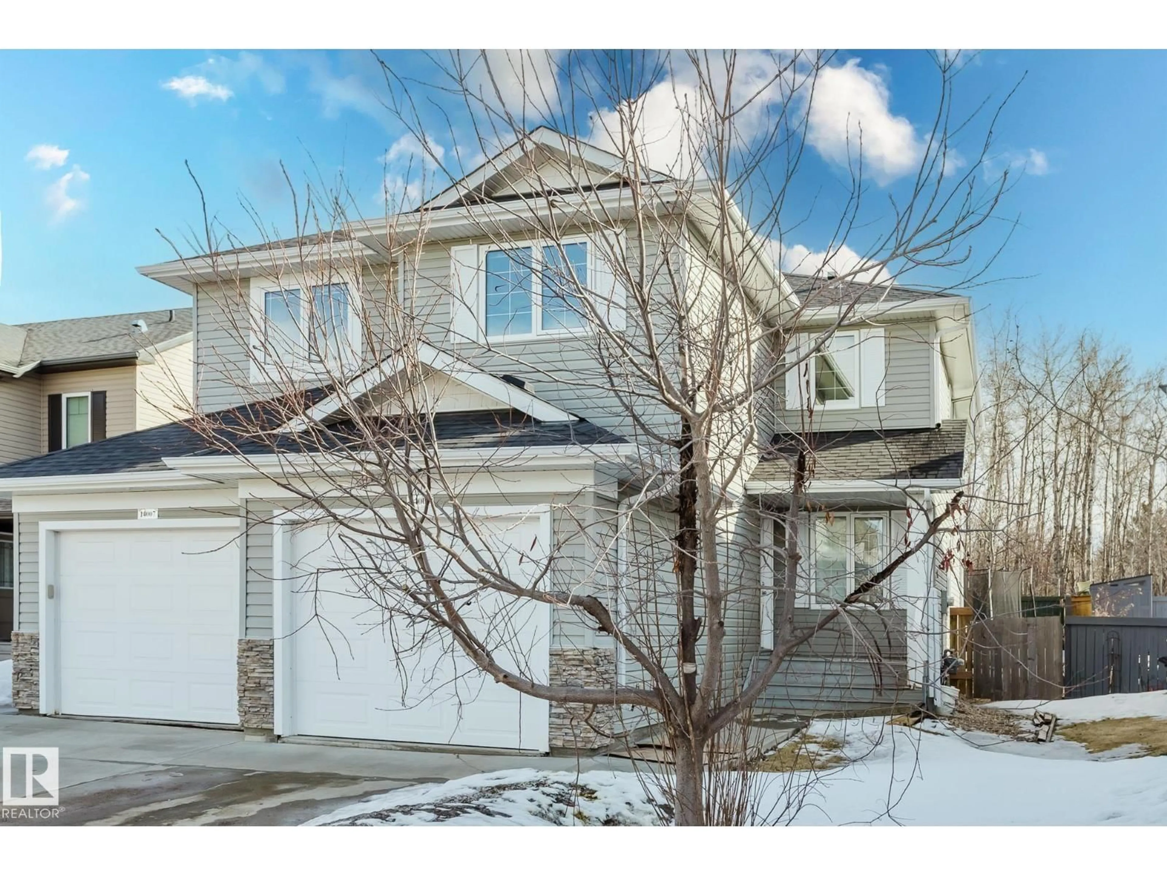 Home with vinyl exterior material, street for 14009 164 AV, Edmonton Alberta T6V0K6