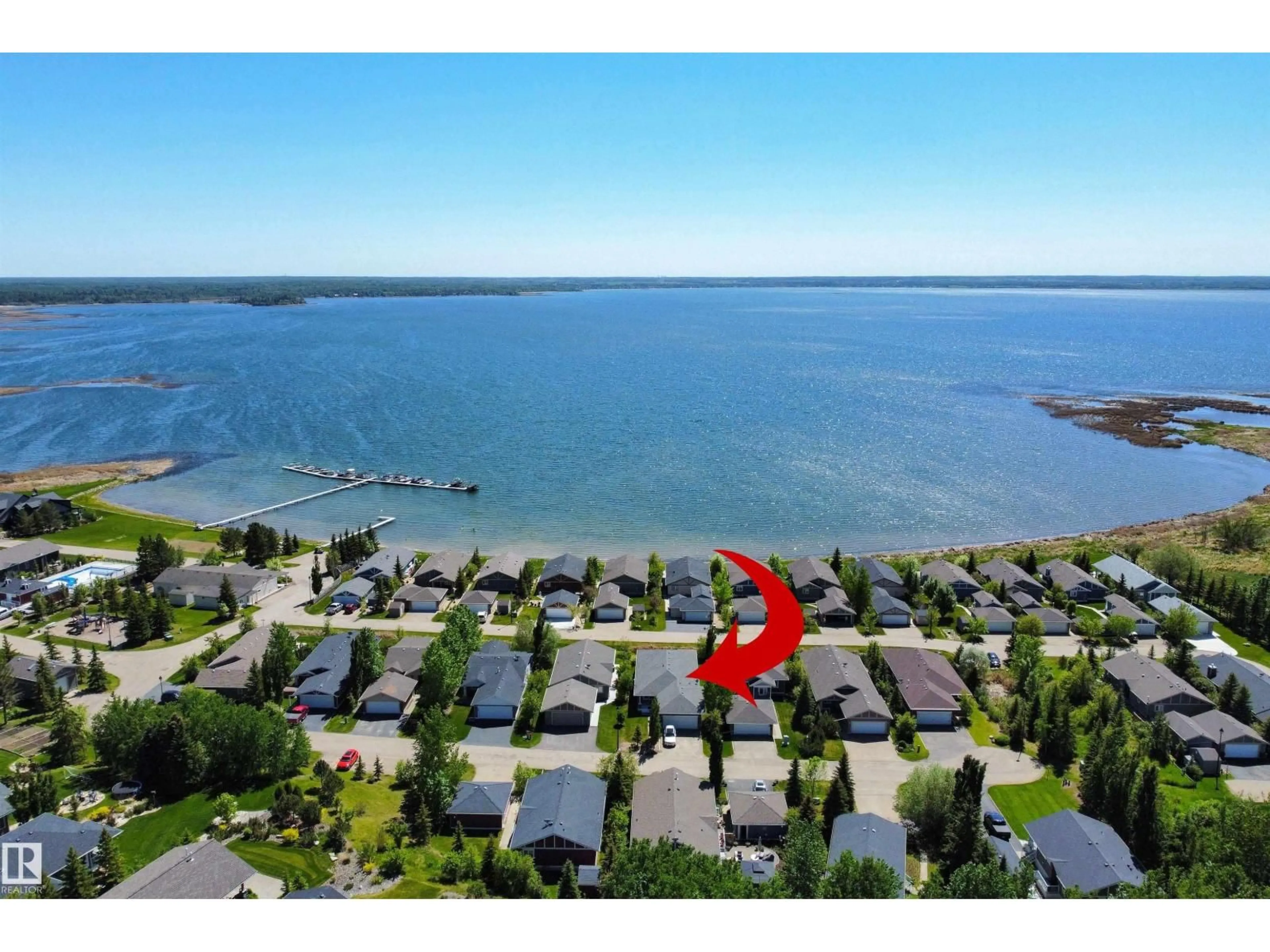 A pic from outside/outdoor area/front of a property/back of a property/a pic from drone, water/lake/river/ocean view for STE. 55101 - 321 ANNE TR, Rural Lac Ste. Anne County Alberta T0E1A1