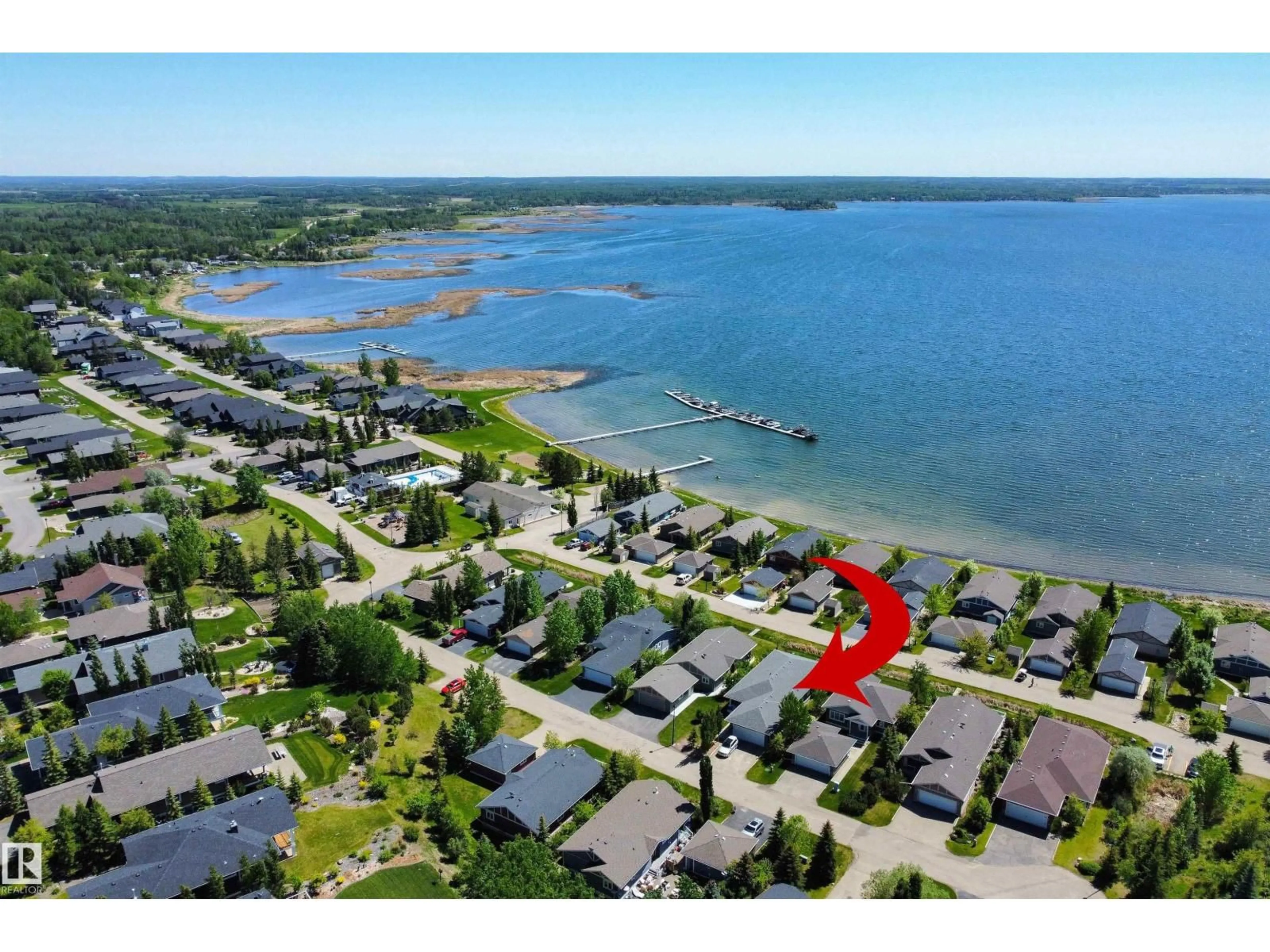 A pic from outside/outdoor area/front of a property/back of a property/a pic from drone, water/lake/river/ocean view for STE. 55101 - 321 ANNE TR, Rural Lac Ste. Anne County Alberta T0E1A1