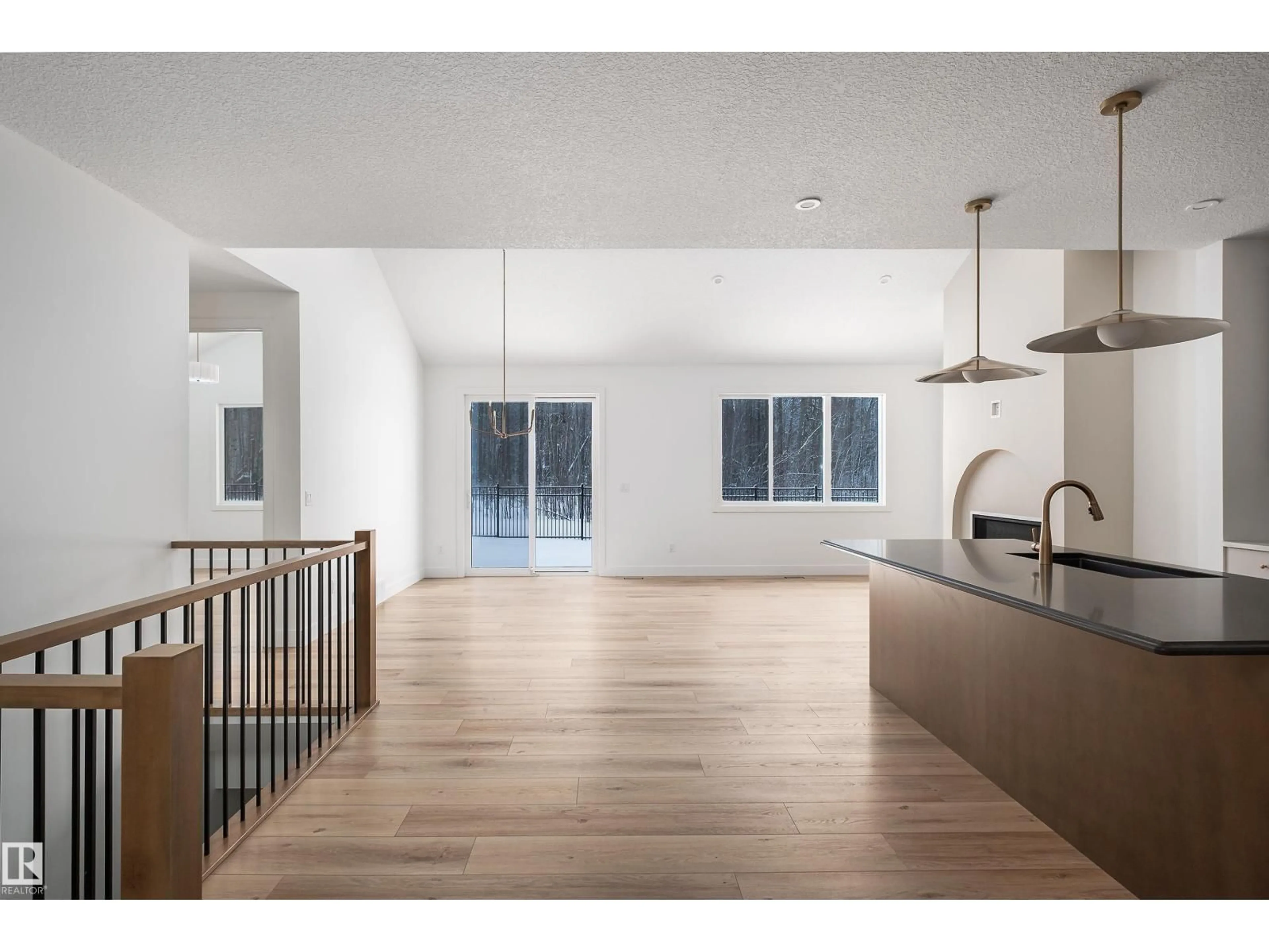 Open concept kitchen, wood/laminate floor for 21 SYDWYCK CI, Spruce Grove Alberta T7X4C9