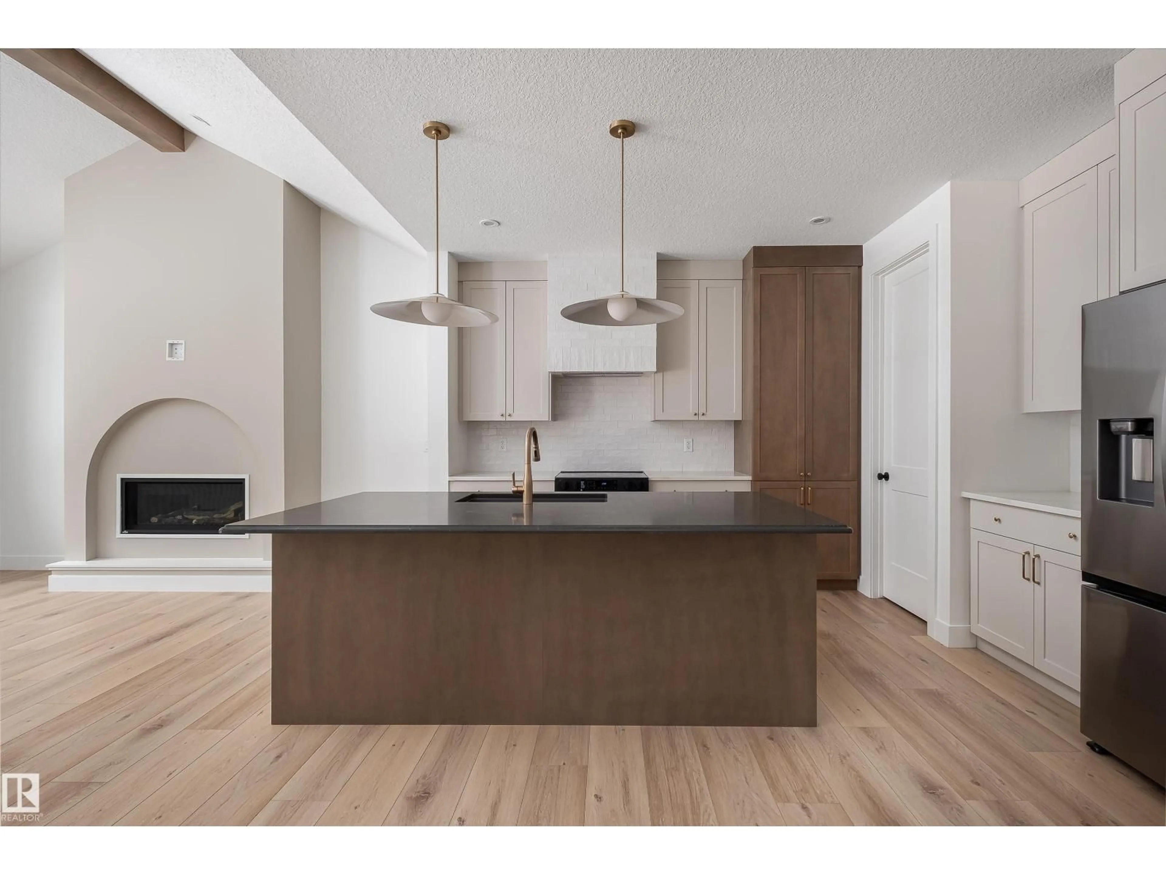 Open concept kitchen, wood/laminate floor for 21 SYDWYCK CI, Spruce Grove Alberta T7X4C9