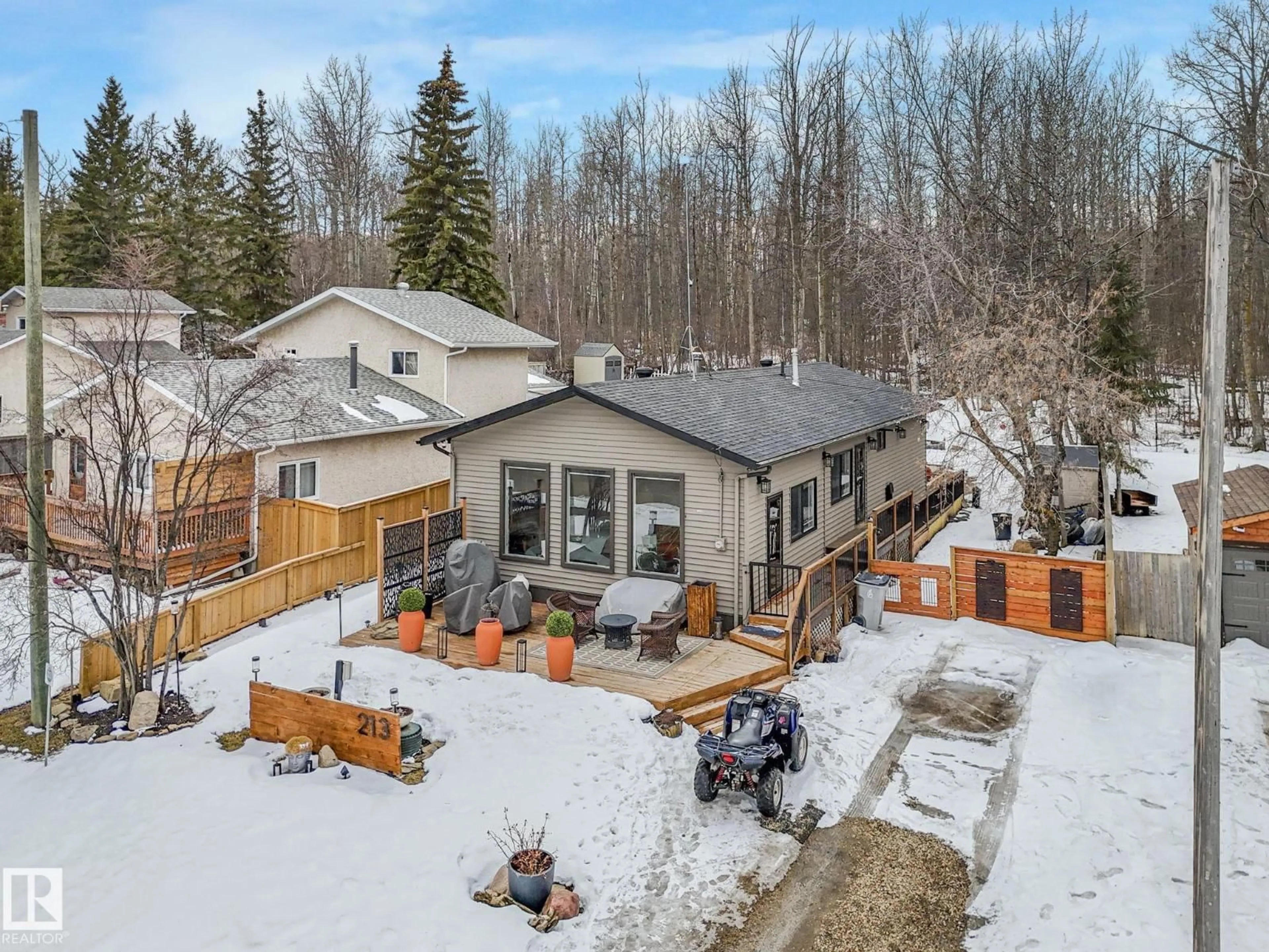 A pic from outside/outdoor area/front of a property/back of a property/a pic from drone, mountain view for 213 CRYSTAL SPRINGS DR, Rural Wetaskiwin County Alberta T0C2V0