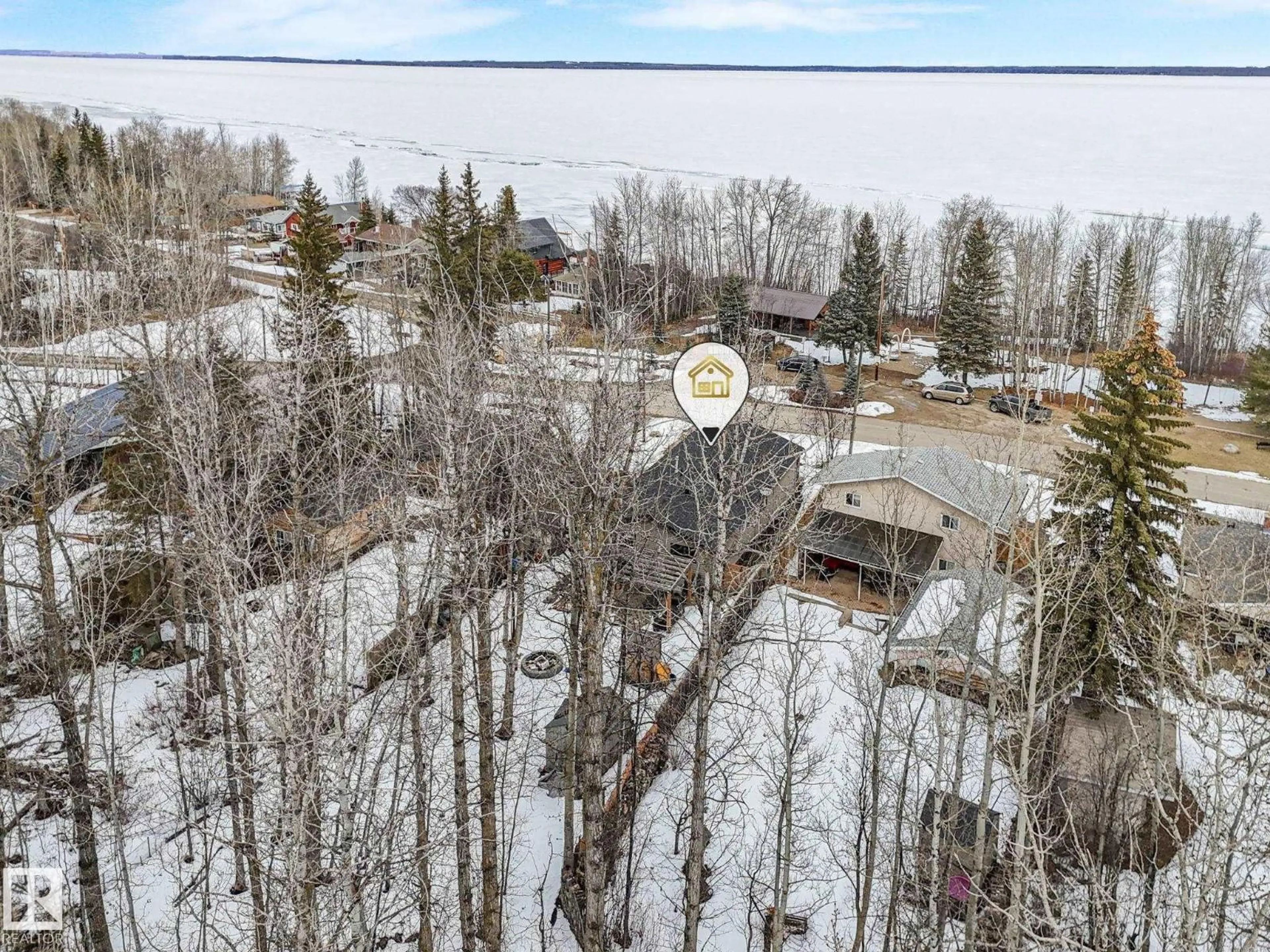 A pic from outside/outdoor area/front of a property/back of a property/a pic from drone, forest/trees view for 213 CRYSTAL SPRINGS DR, Rural Wetaskiwin County Alberta T0C2V0
