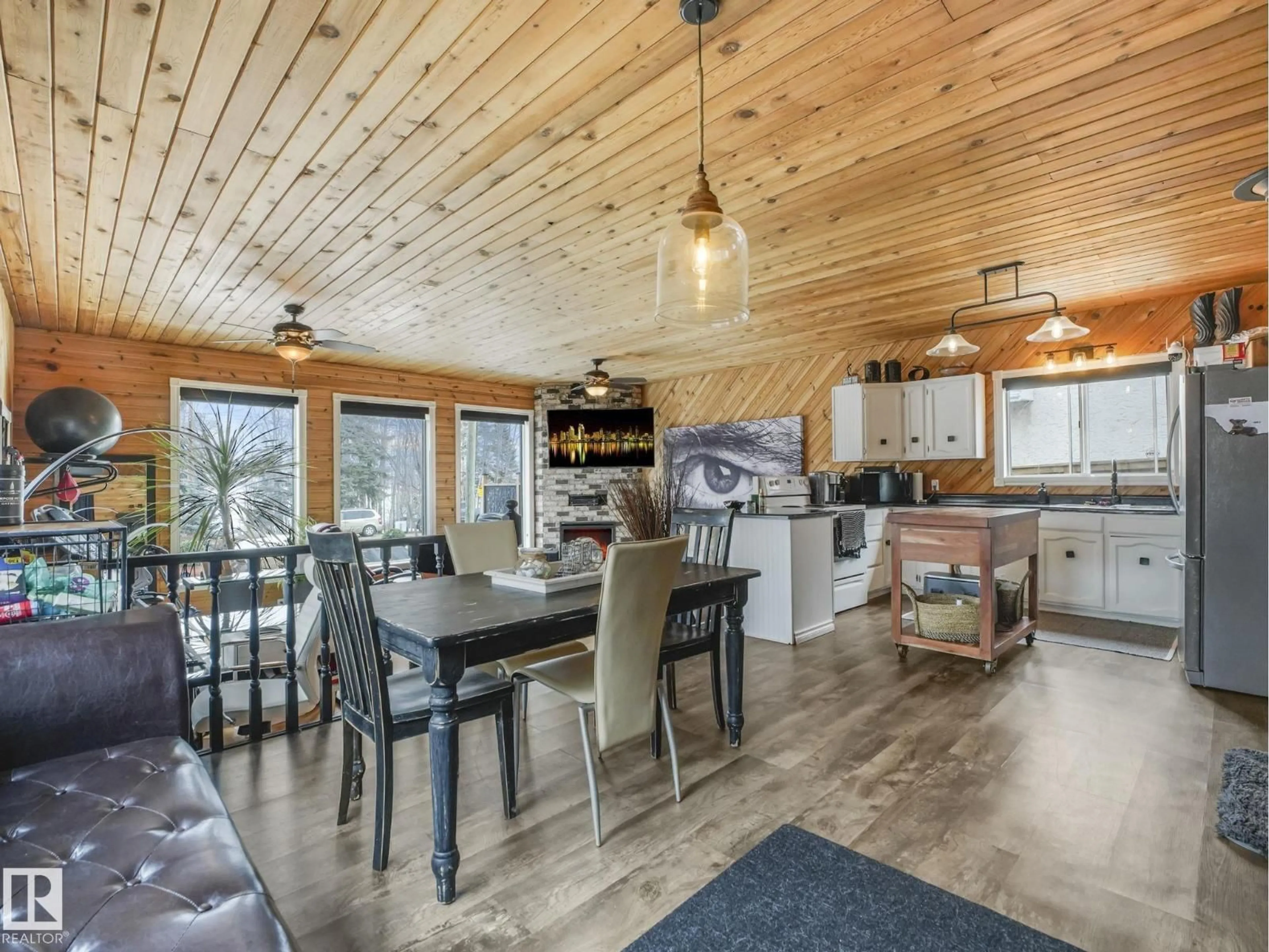 Open concept kitchen, wood/laminate floor for 213 CRYSTAL SPRINGS DR, Rural Wetaskiwin County Alberta T0C2V0