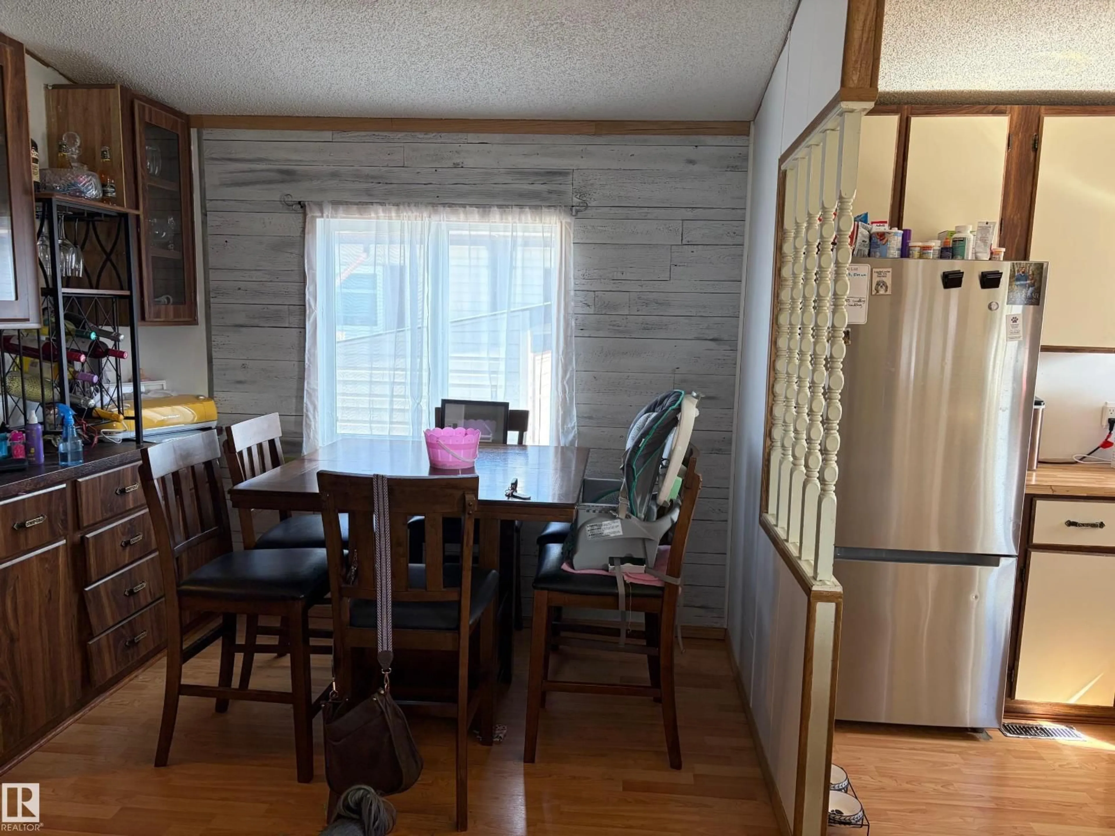 Dining room, wood/laminate floor for 32 - 4202 45 ST, Wetaskiwin Alberta T9A2L3