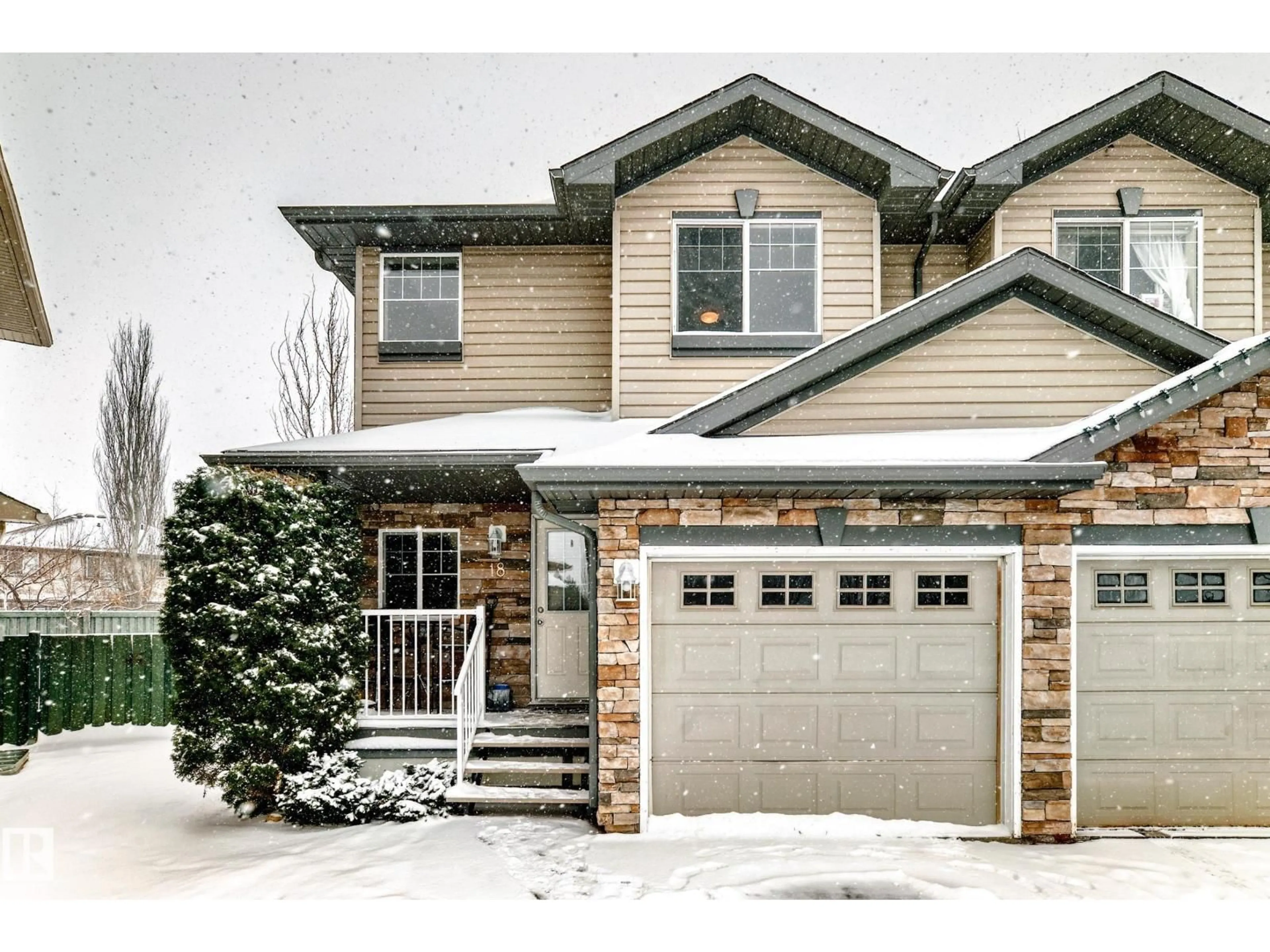 Home with brick exterior material, street for 18 12104 16 AV SW, Edmonton Alberta T6W1X3
