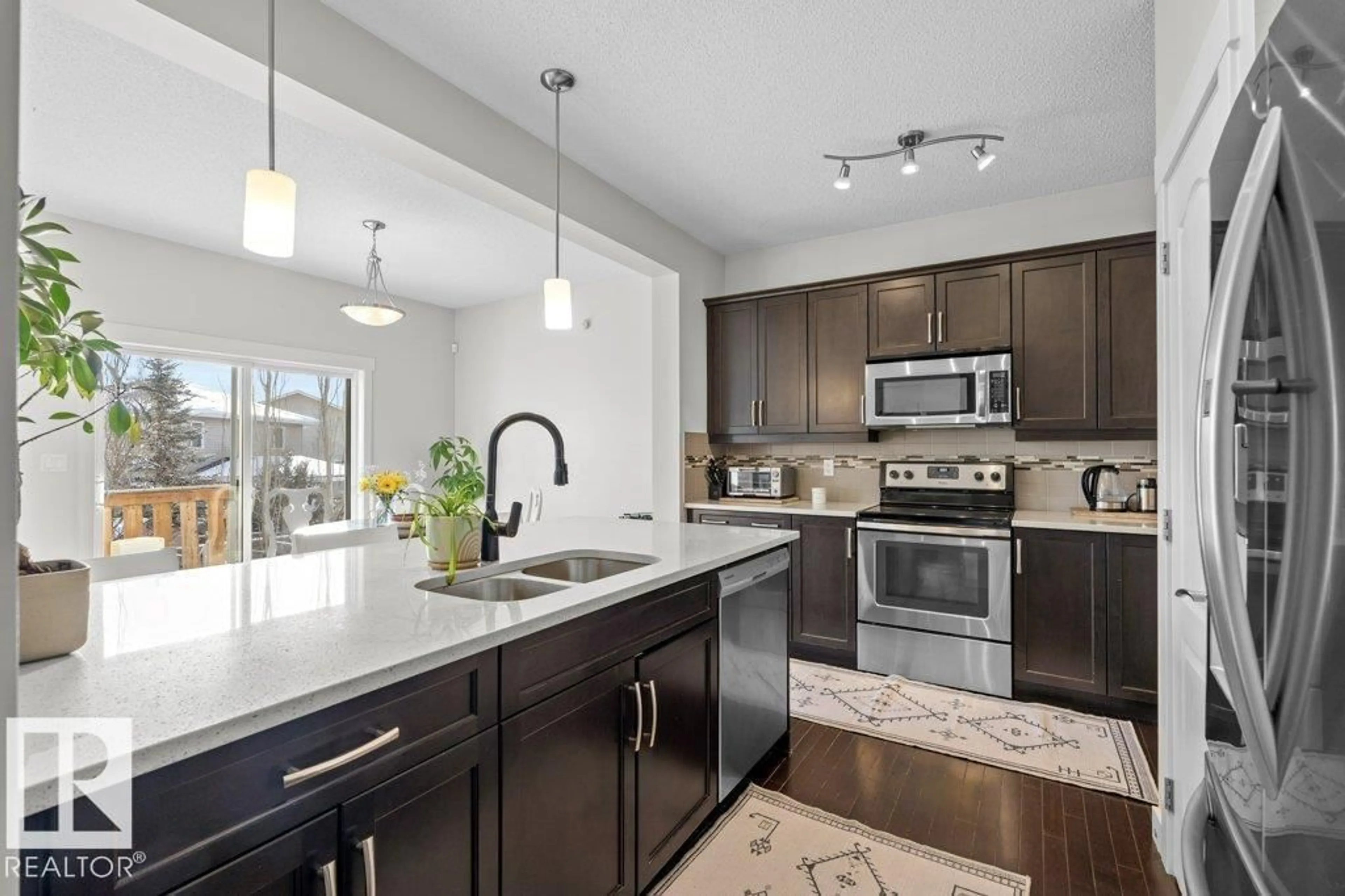 Open concept kitchen, ceramic/tile floor for 1227 SECORD LANDING LD, Edmonton Alberta T5T4N3