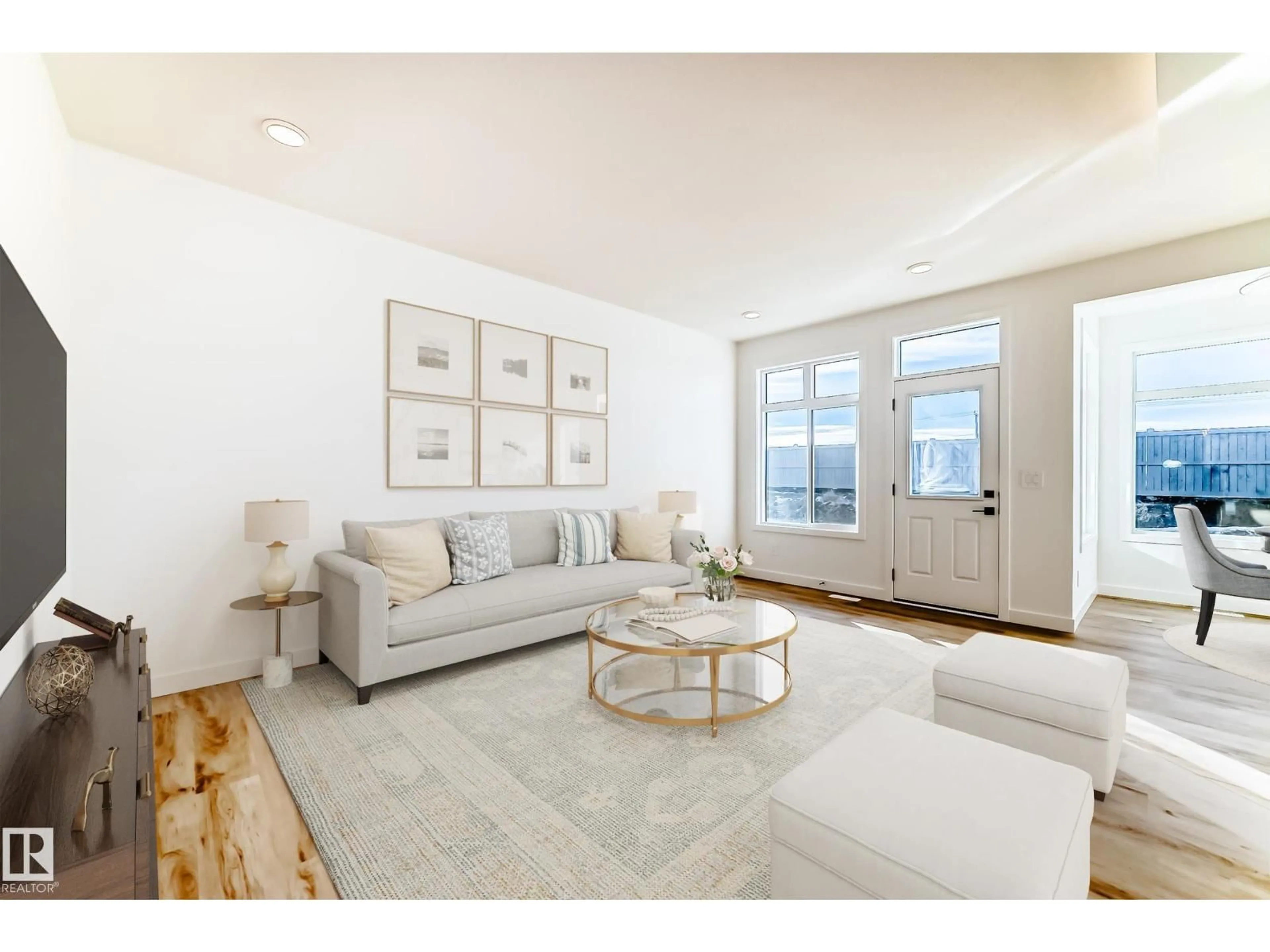 Living room with furniture, unknown for NW - 4132 208 ST, Edmonton Alberta T6W5S2