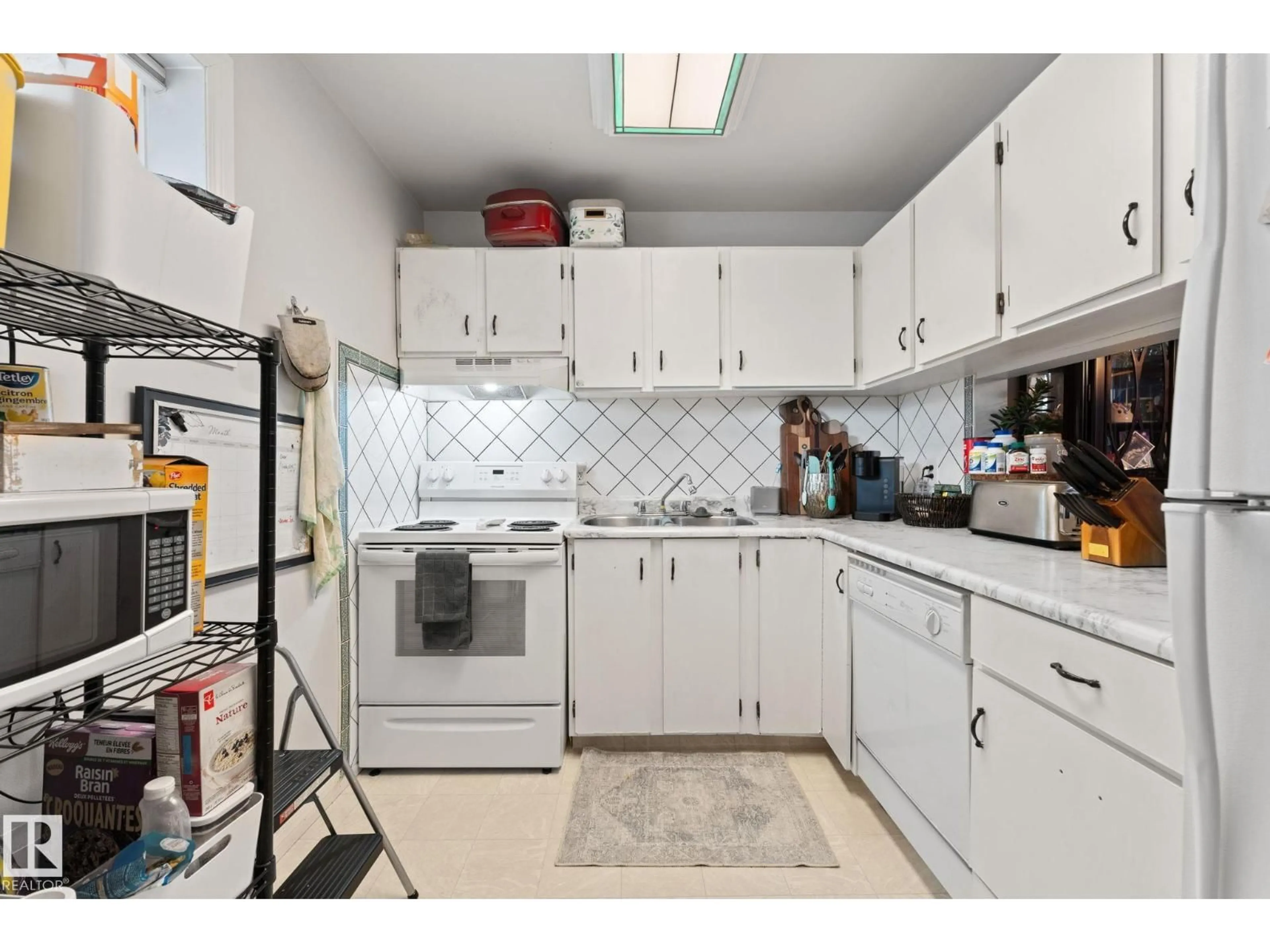 Standard kitchen, ceramic/tile floor for 6063 35A AV, Edmonton Alberta T6L1G7