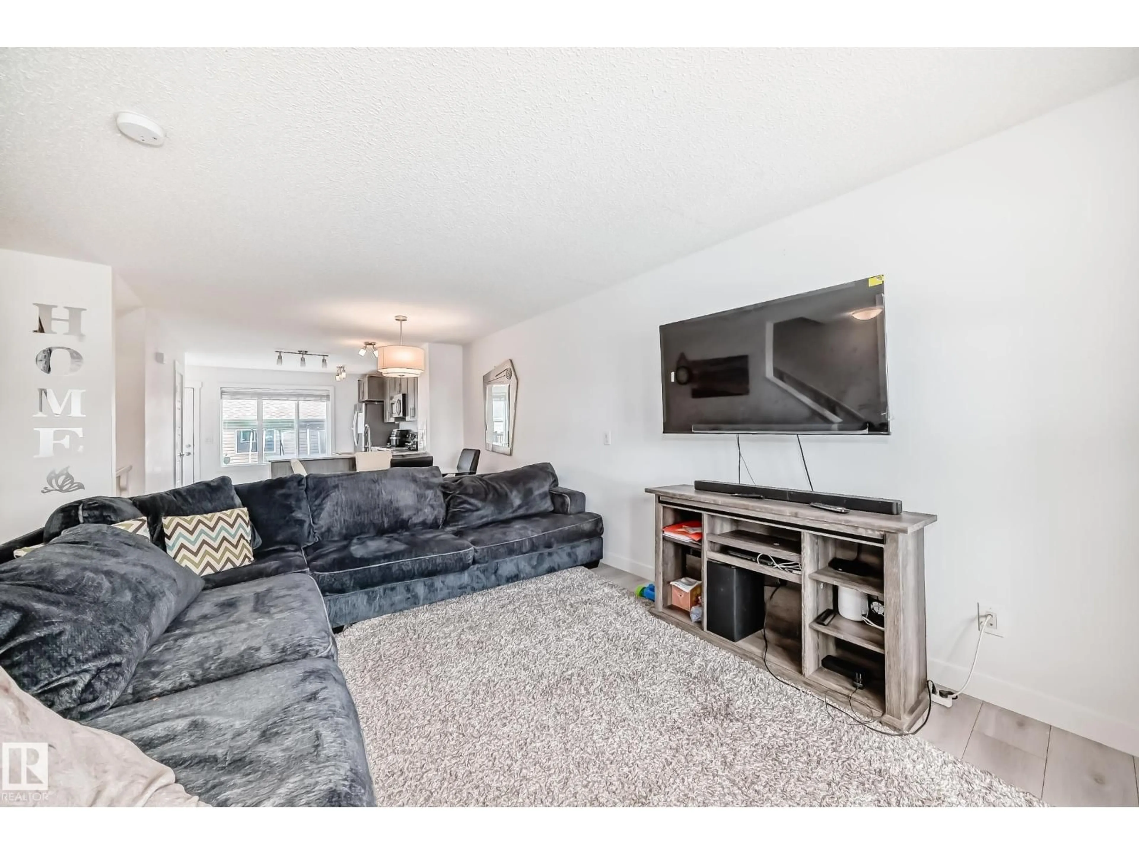 Living room with furniture, unknown for 374 CRYSTALLINA NERA DR, Edmonton Alberta T5Z0R9