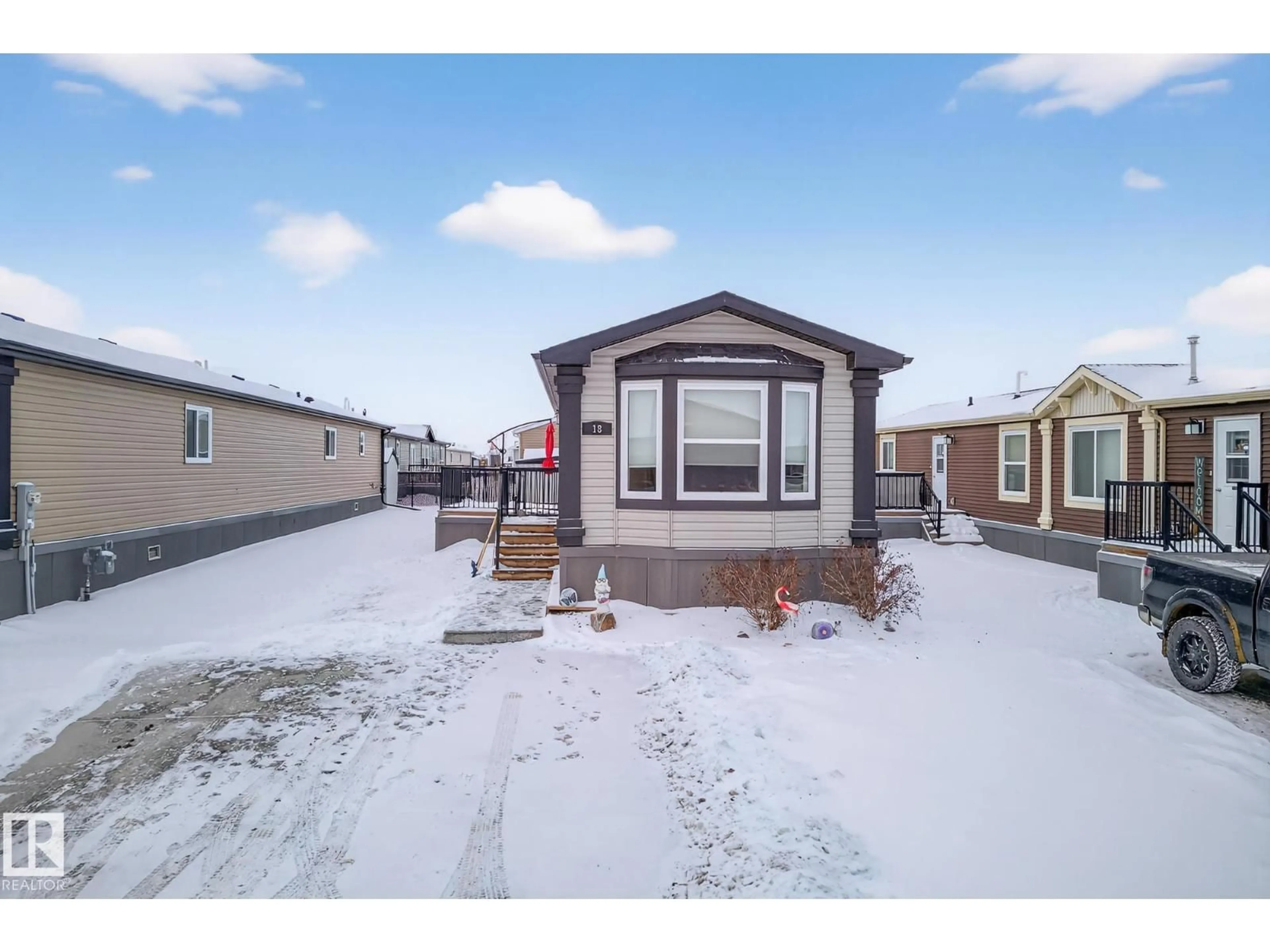 Home with vinyl exterior material, street for 18 ASPEN AV, Morinville Alberta T8R2P7