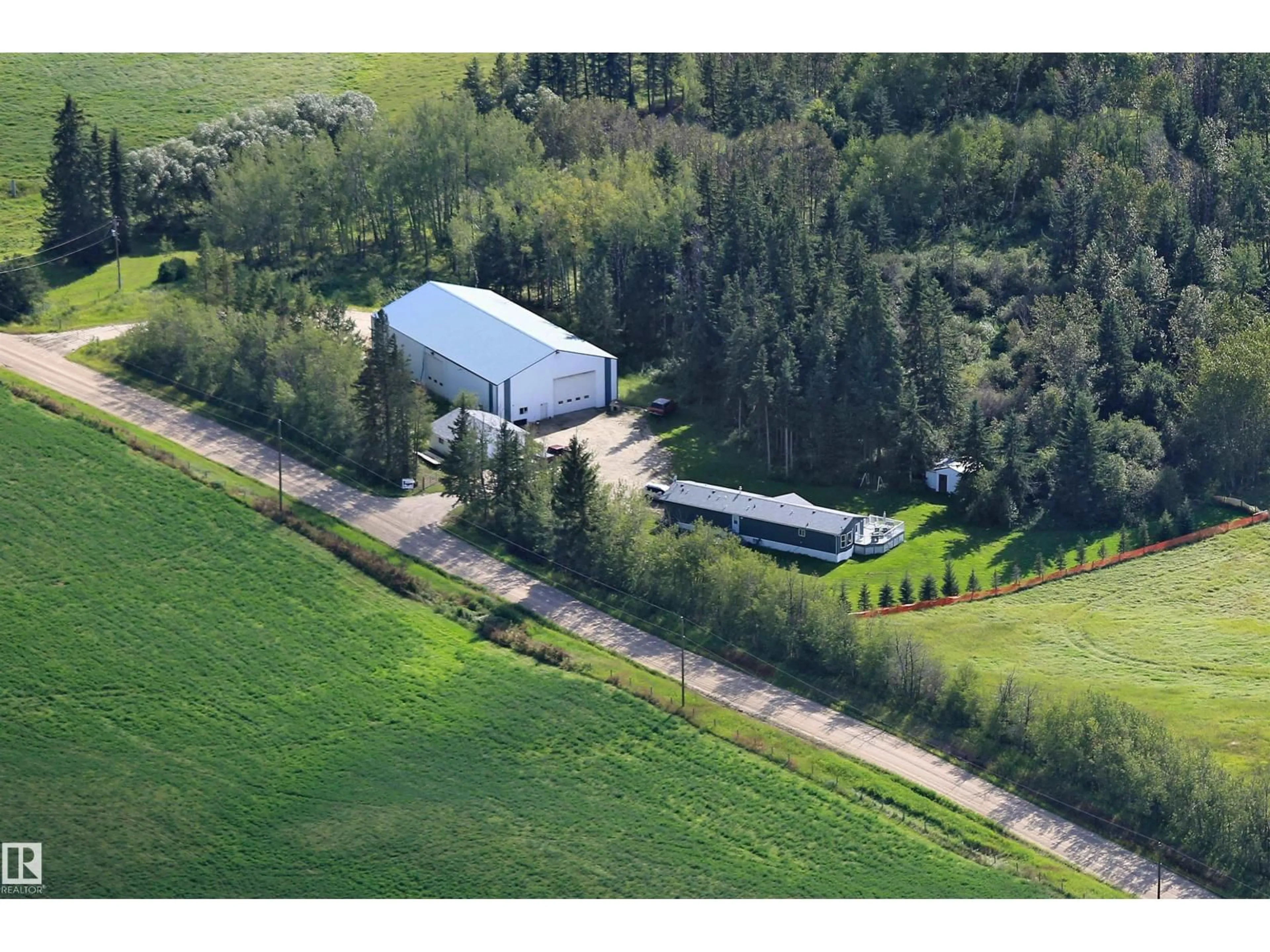 A pic from outside/outdoor area/front of a property/back of a property/a pic from drone, building for 56326 RGE RD 65, Rural Lac Ste. Anne County Alberta T0E2A0