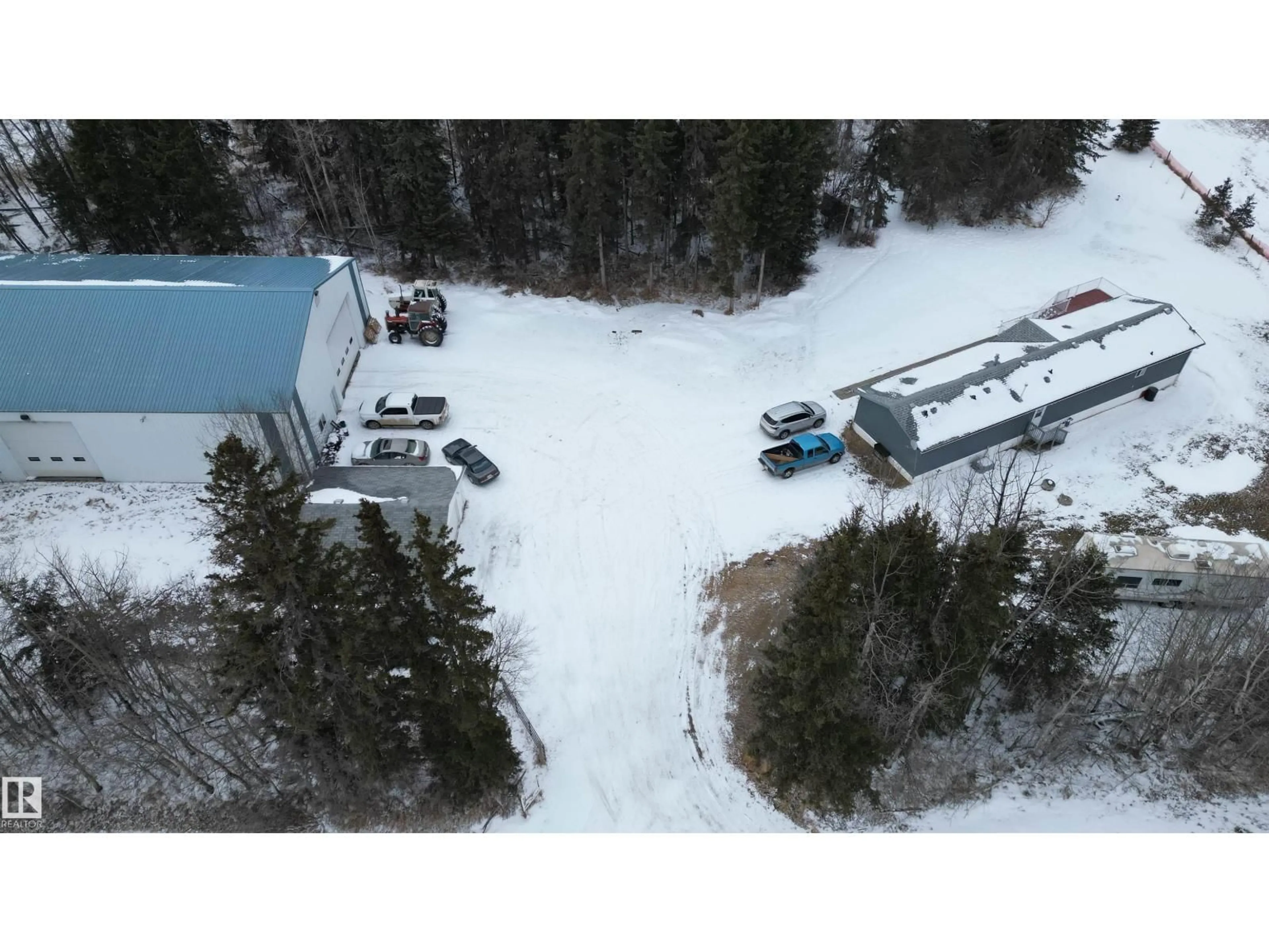 A pic from outside/outdoor area/front of a property/back of a property/a pic from drone, unknown for 56326 RGE RD 65, Rural Lac Ste. Anne County Alberta T0E2A0