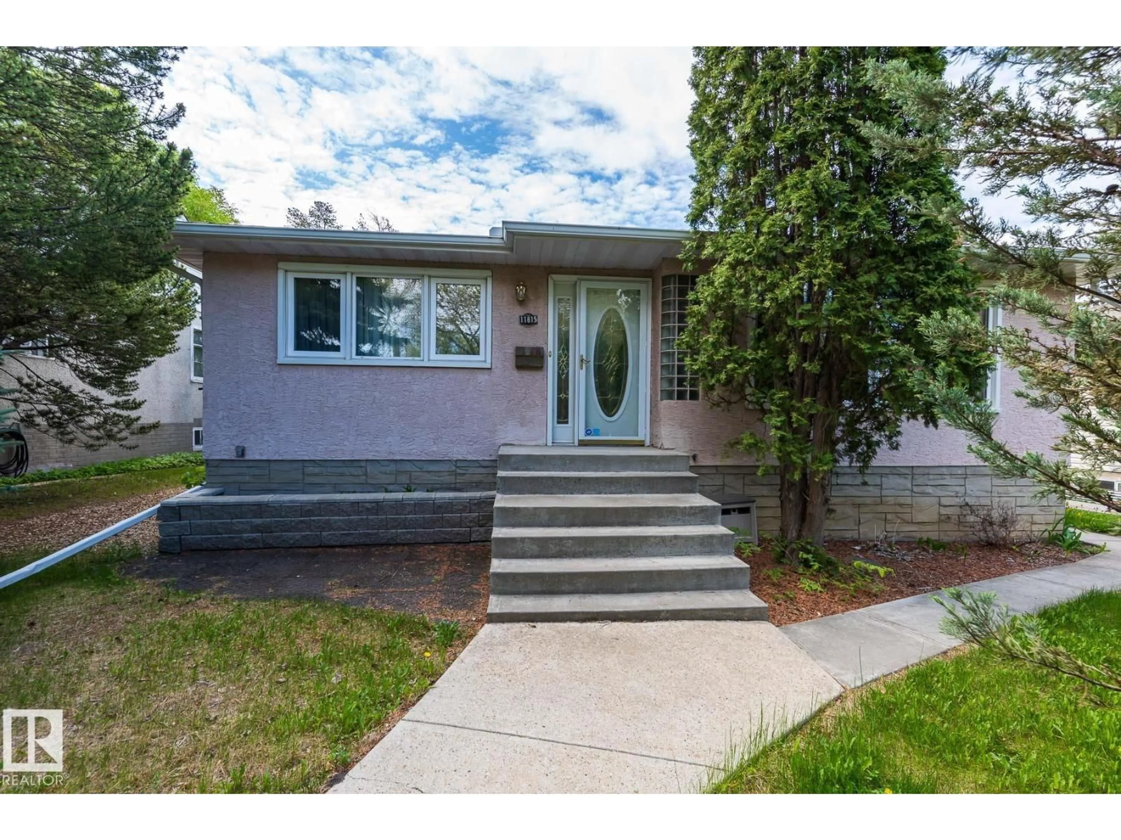 Home with vinyl exterior material, street for 11815 76 AV, Edmonton Alberta T6G0L1