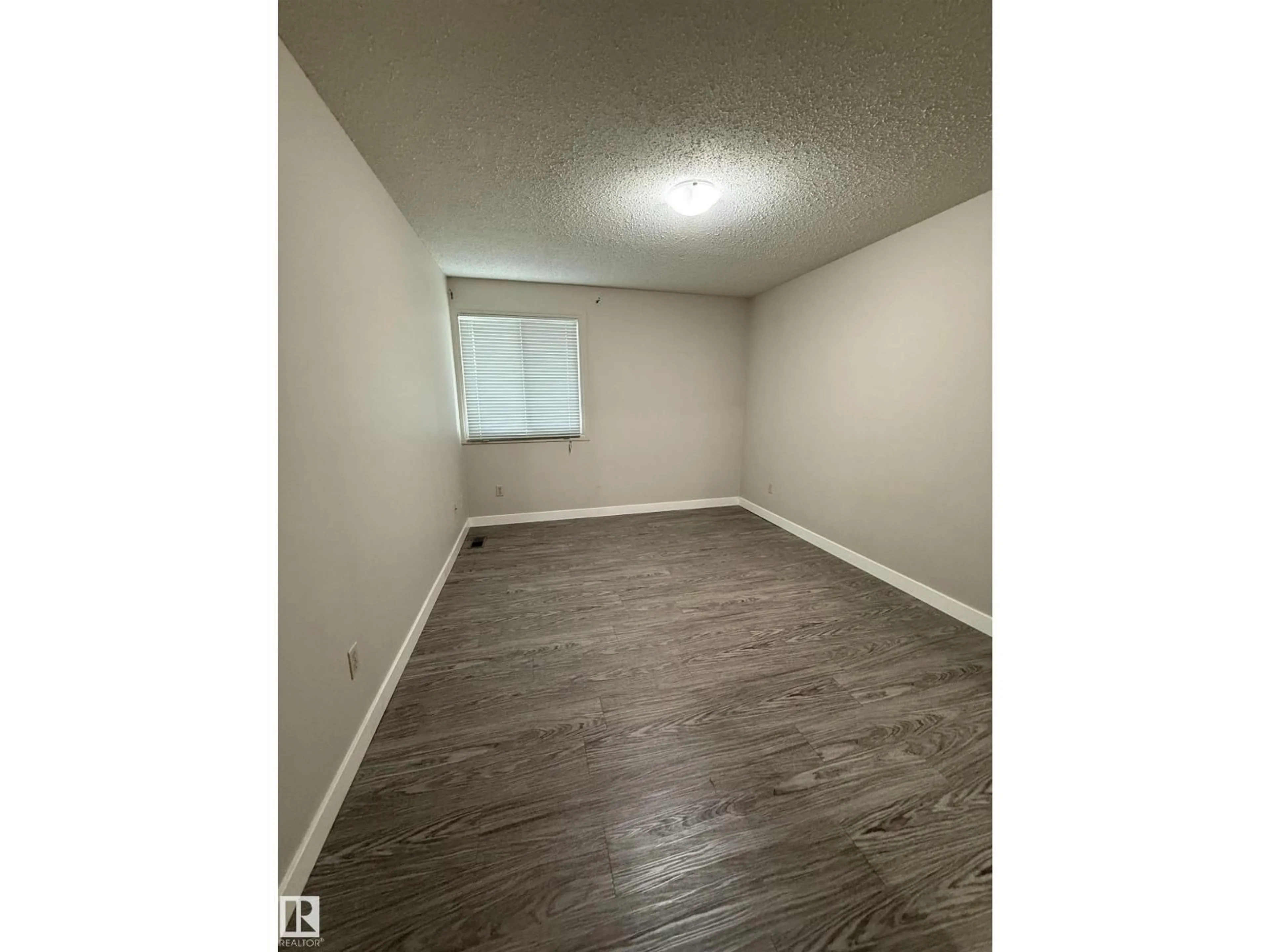A pic of a room for #105 - 6212 180 ST, Edmonton Alberta T5T2T2