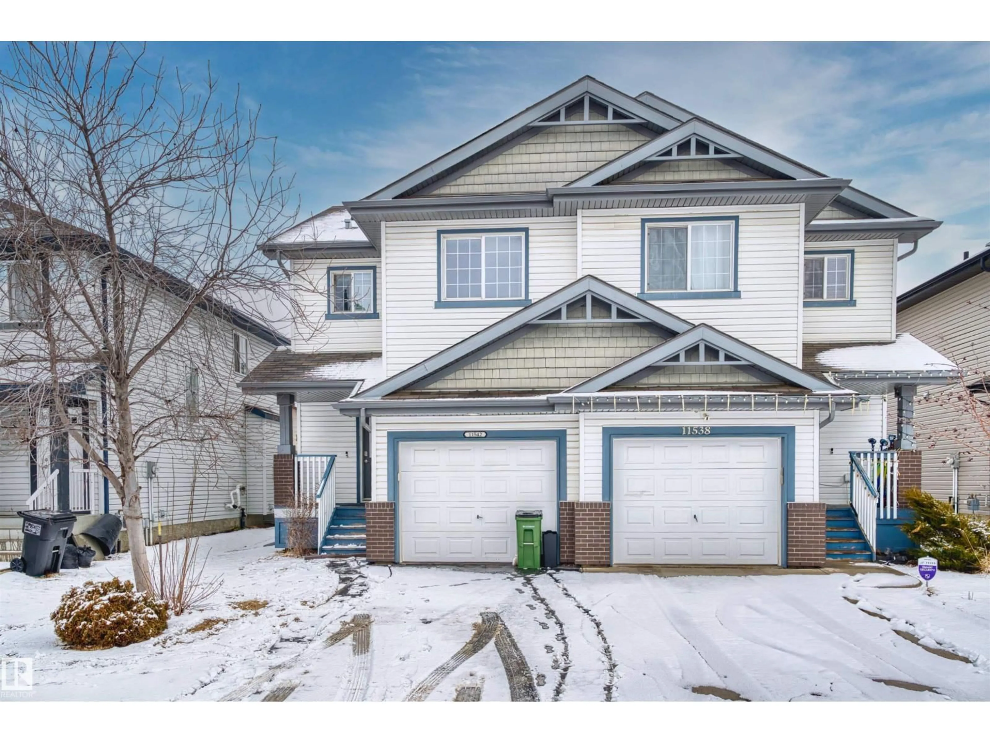 Home with vinyl exterior material, street for 11542 18A AV, Edmonton Alberta T6W2E6