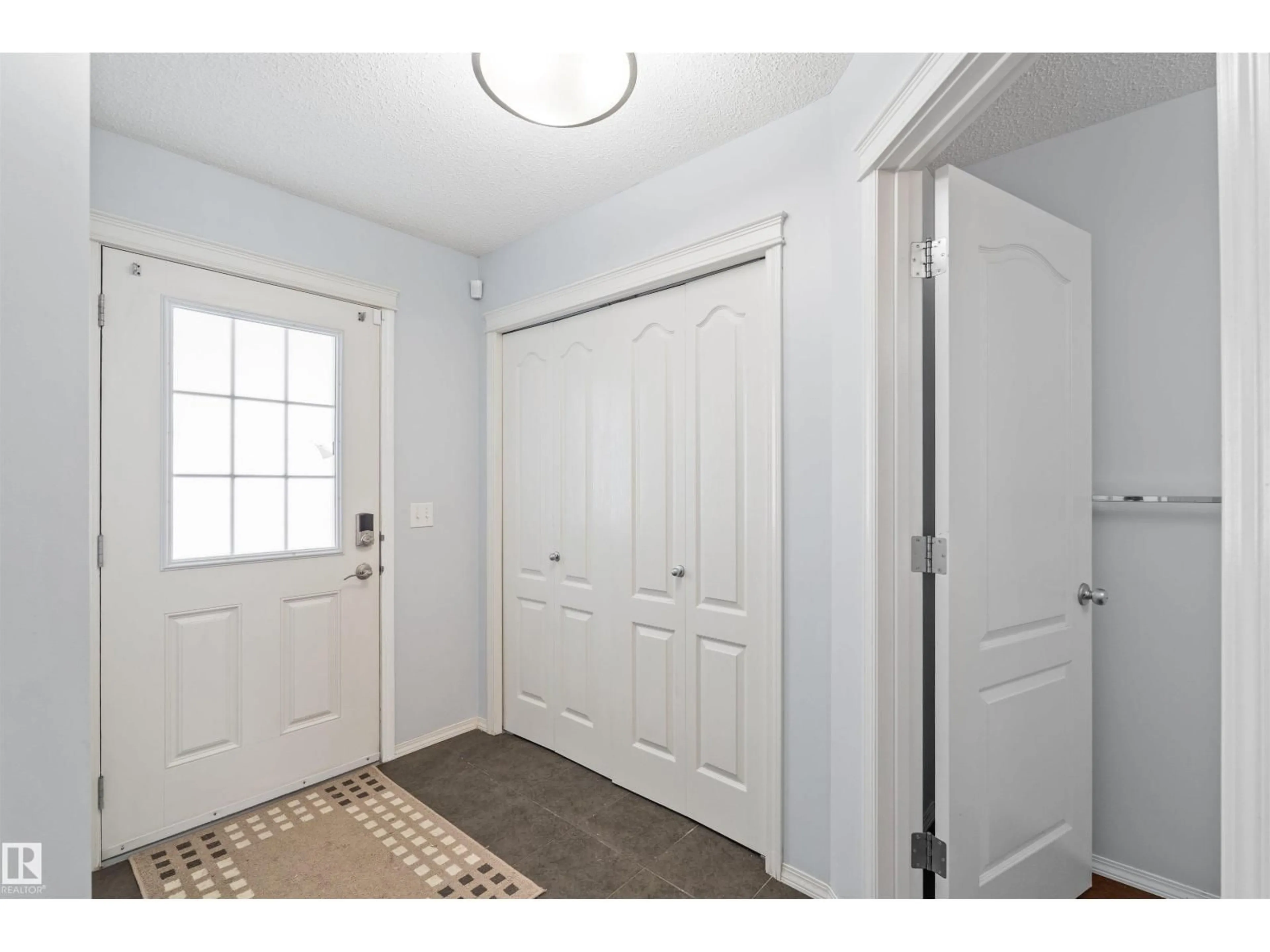 Indoor entryway for 11542 18A AV, Edmonton Alberta T6W2E6