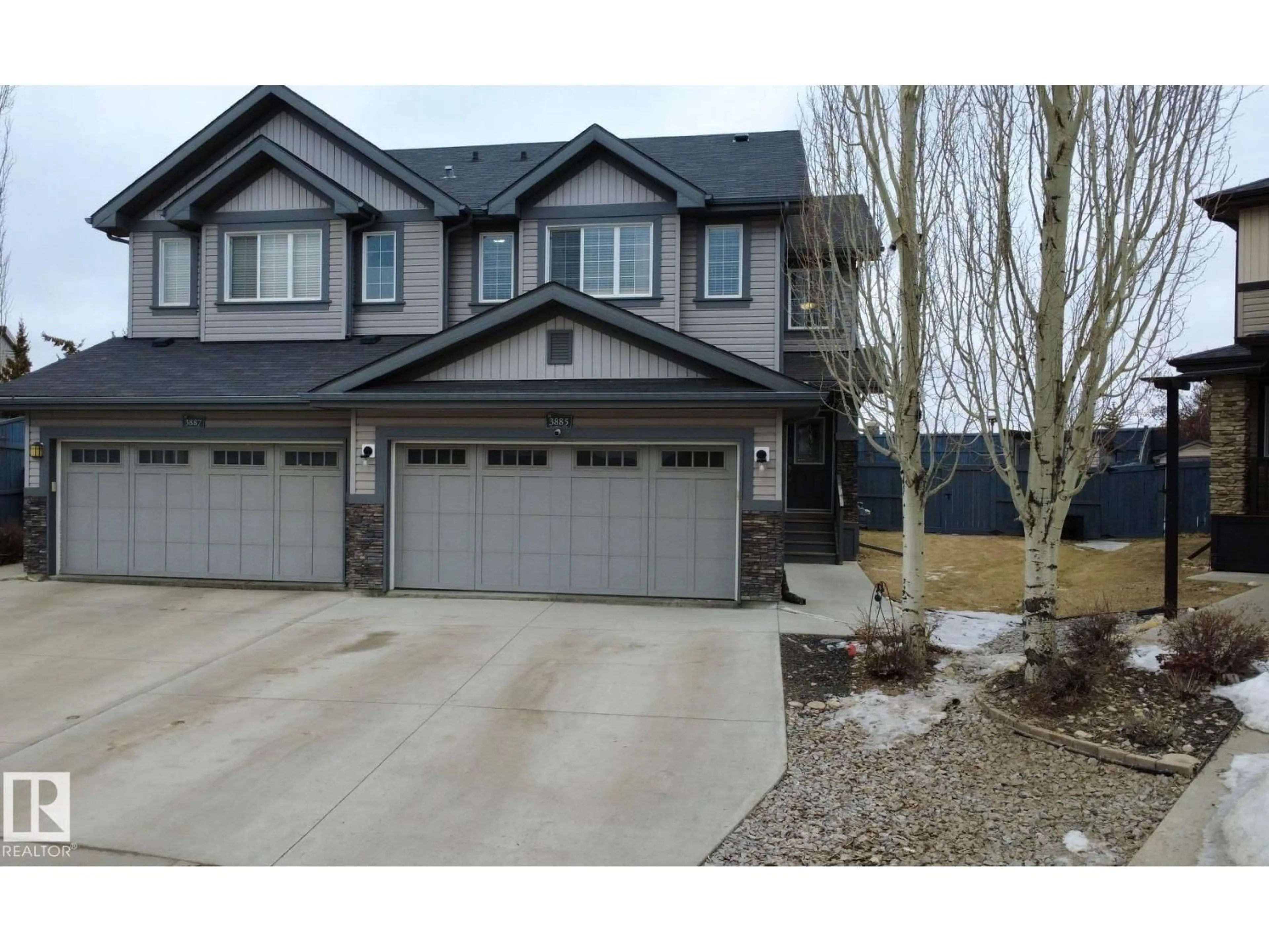 Home with vinyl exterior material, street for NW - 3885 GALLINGER LO, Edmonton Alberta T5T4G6