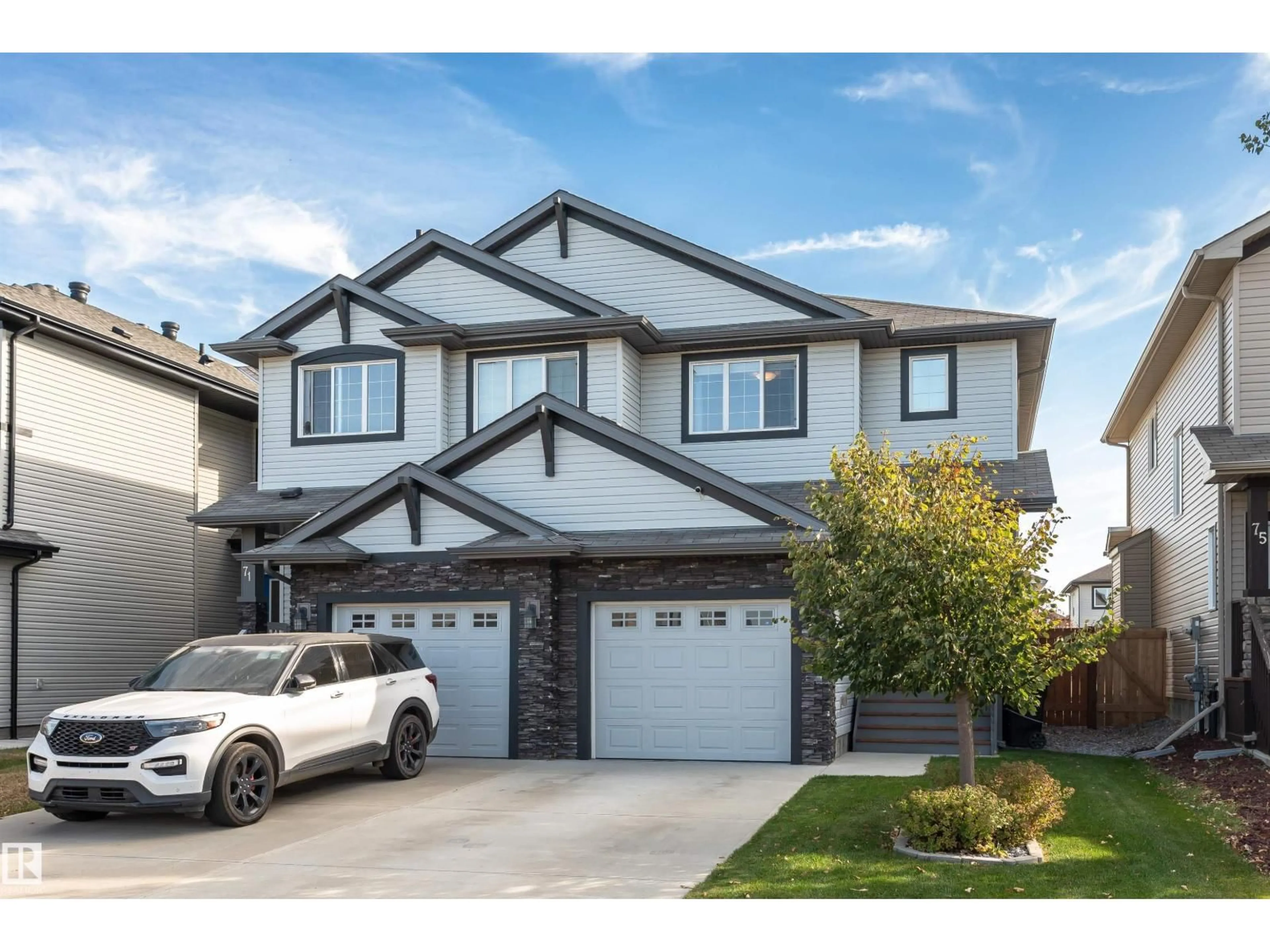 Home with vinyl exterior material, street for 73 ELM ST, Fort Saskatchewan Alberta T8L0R6