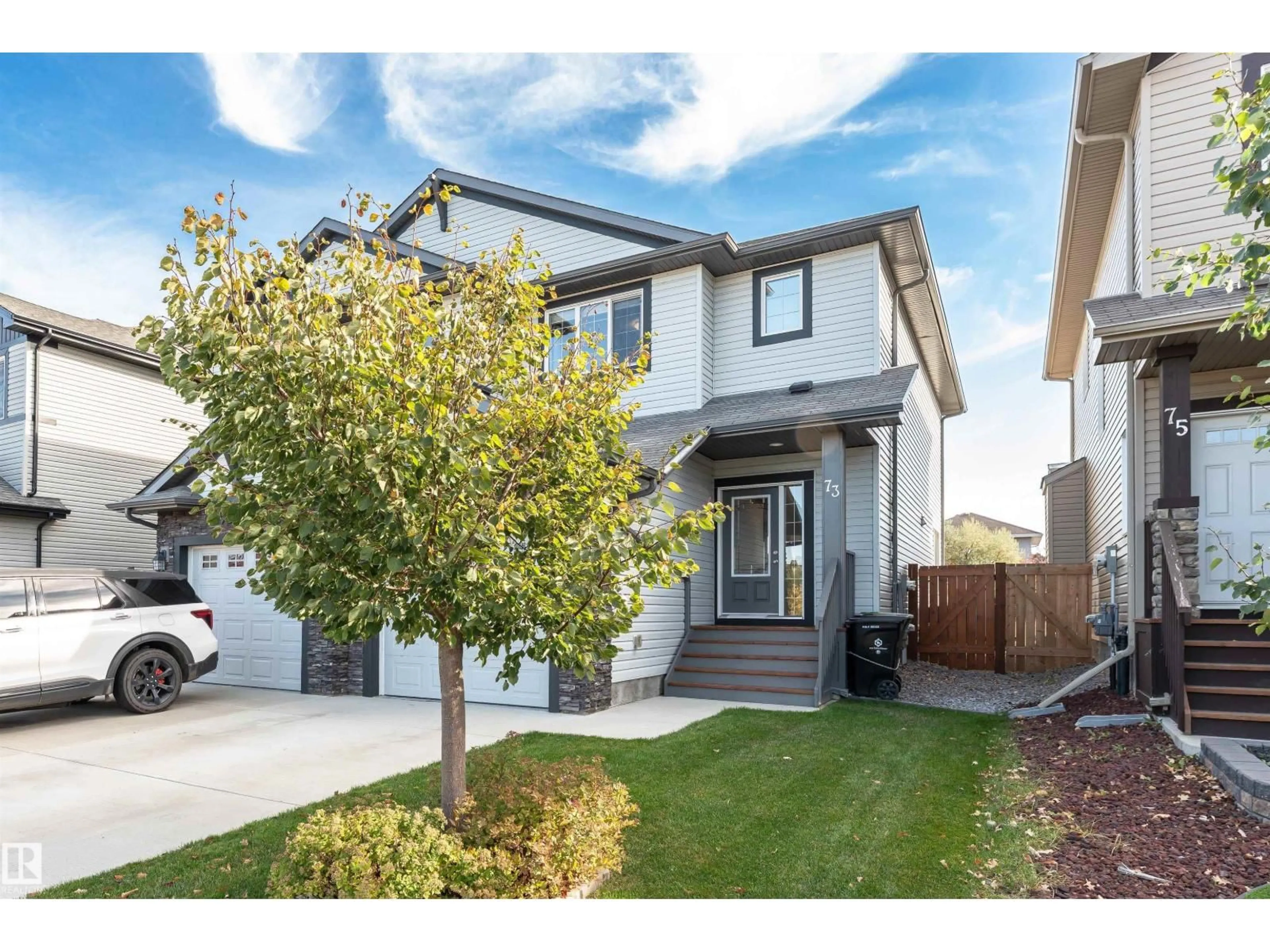Home with vinyl exterior material, street for 73 ELM ST, Fort Saskatchewan Alberta T8L0R6