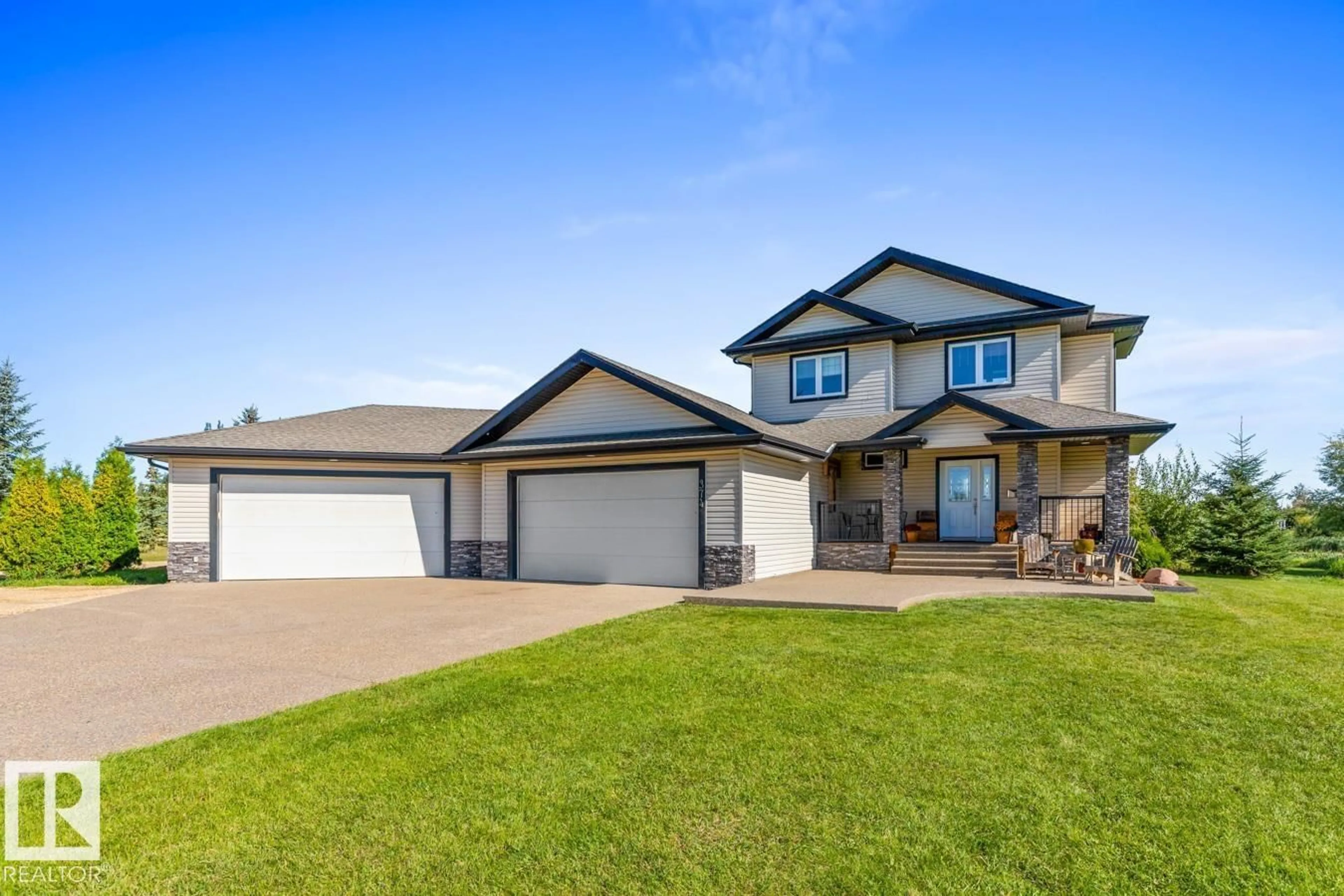 Home with vinyl exterior material, street for 52358 - 374 RGE ROAD 225, Rural Strathcona County Alberta T8C1J7
