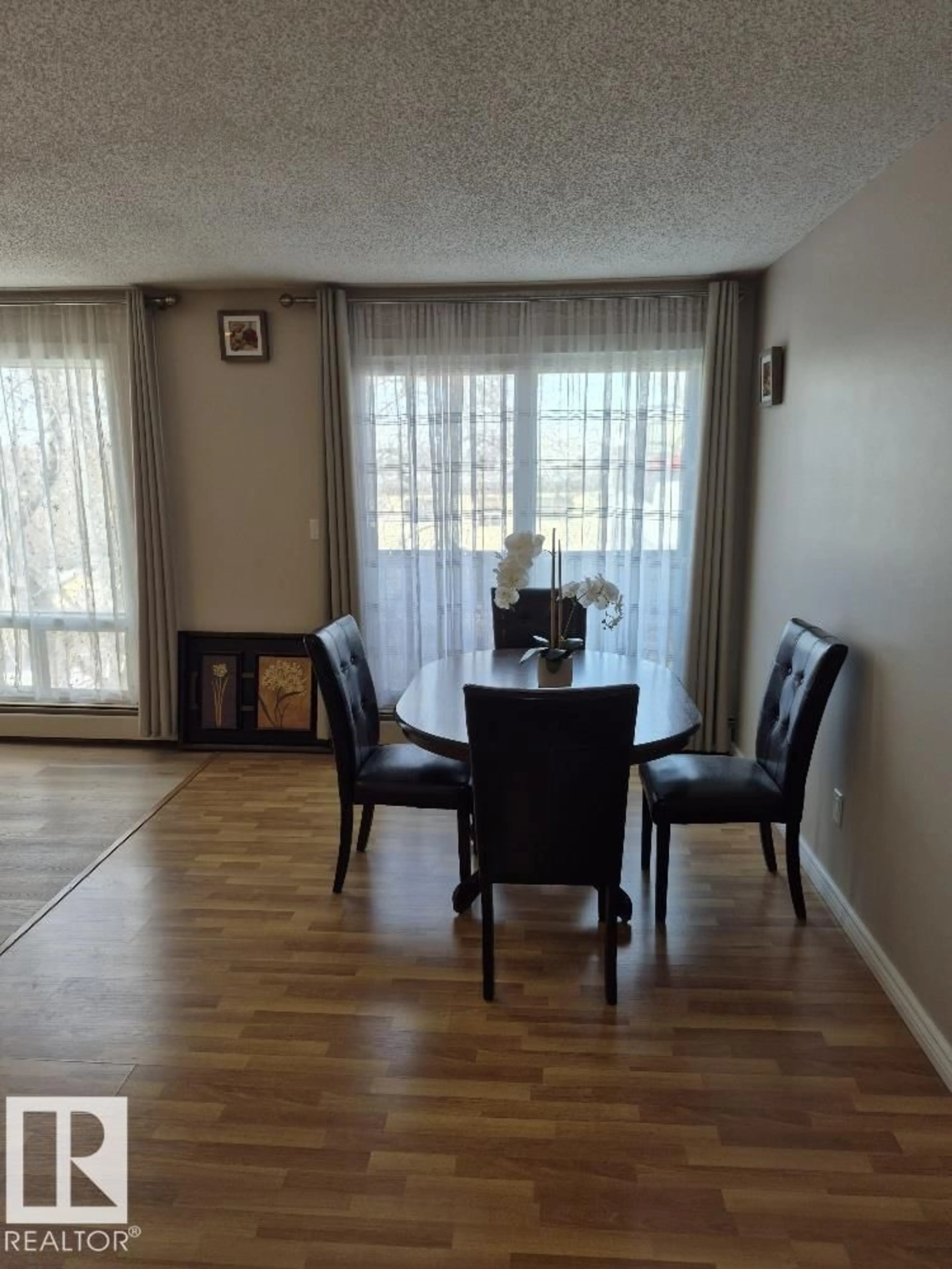 Dining room, wood/laminate floor for #402 - 9323 105 AVE, Edmonton Alberta T5H0J7