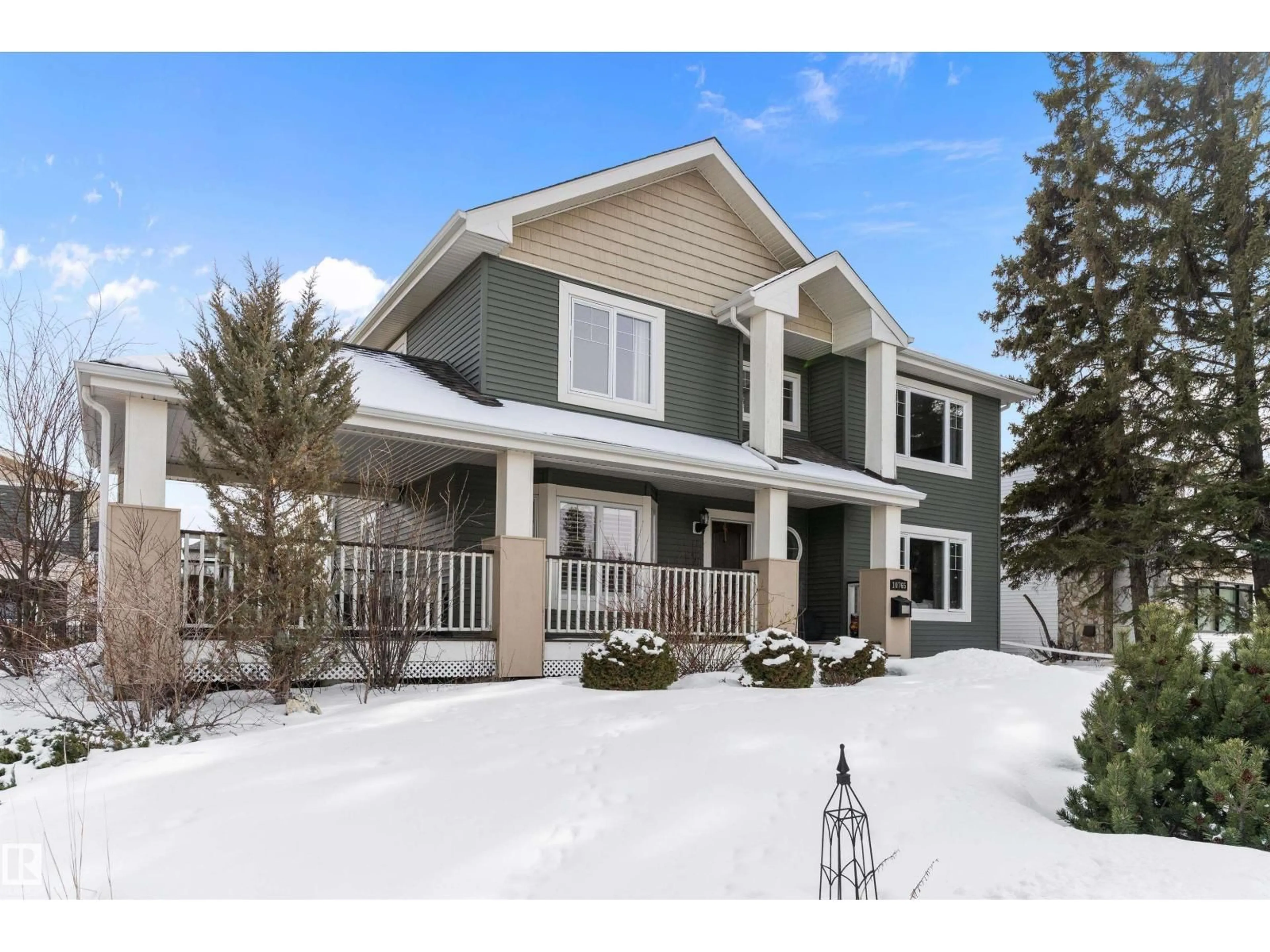 Home with vinyl exterior material, street for NW - 10765 65 ST, Edmonton Alberta T6A2P3