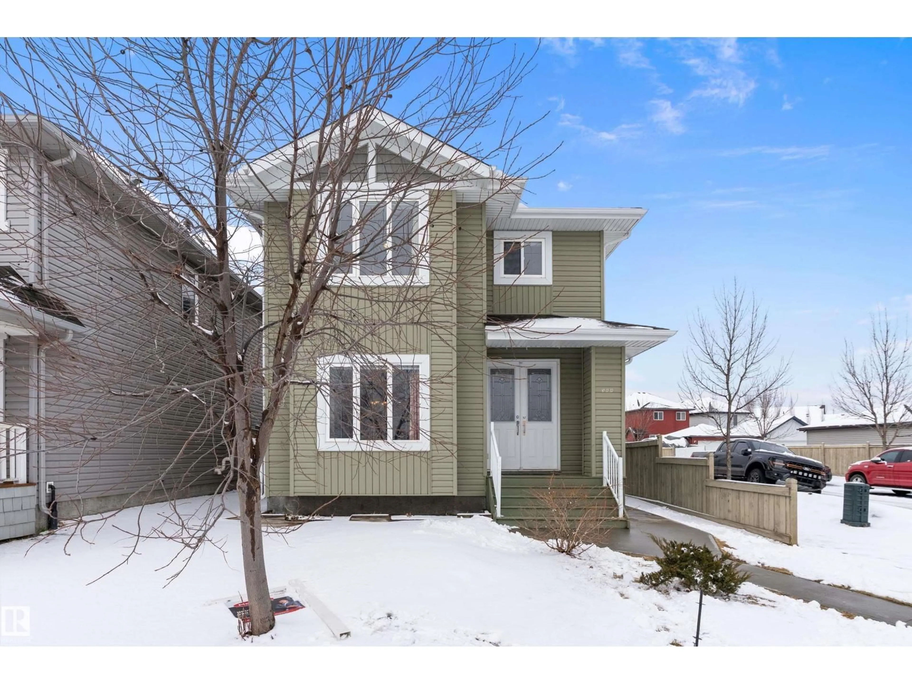 Home with vinyl exterior material, street for 598 TAMARACK RD, Edmonton Alberta T6T0M8