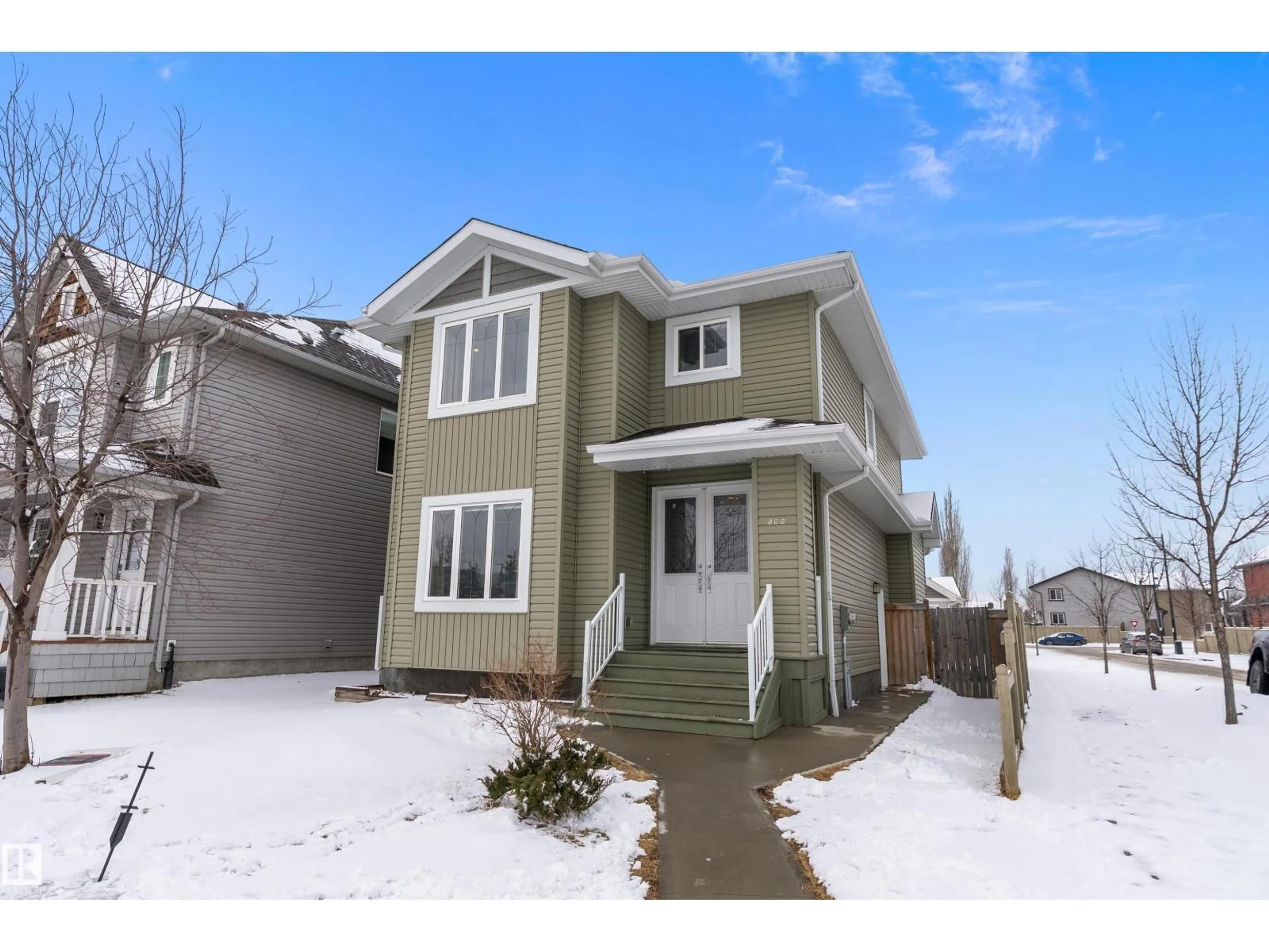 Home with vinyl exterior material, street for 598 TAMARACK RD, Edmonton Alberta T6T0M8