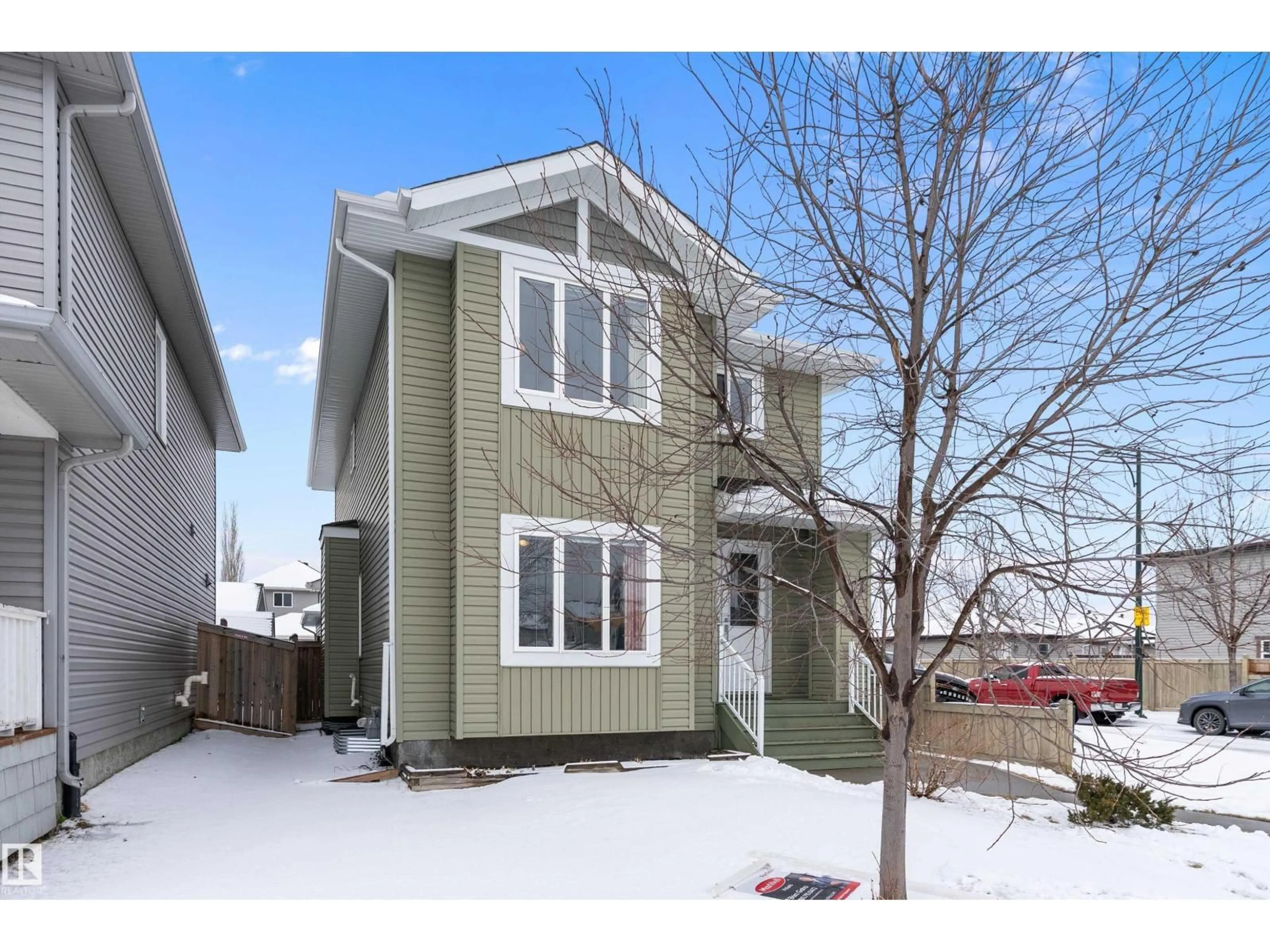 Home with vinyl exterior material, street for 598 TAMARACK RD, Edmonton Alberta T6T0M8