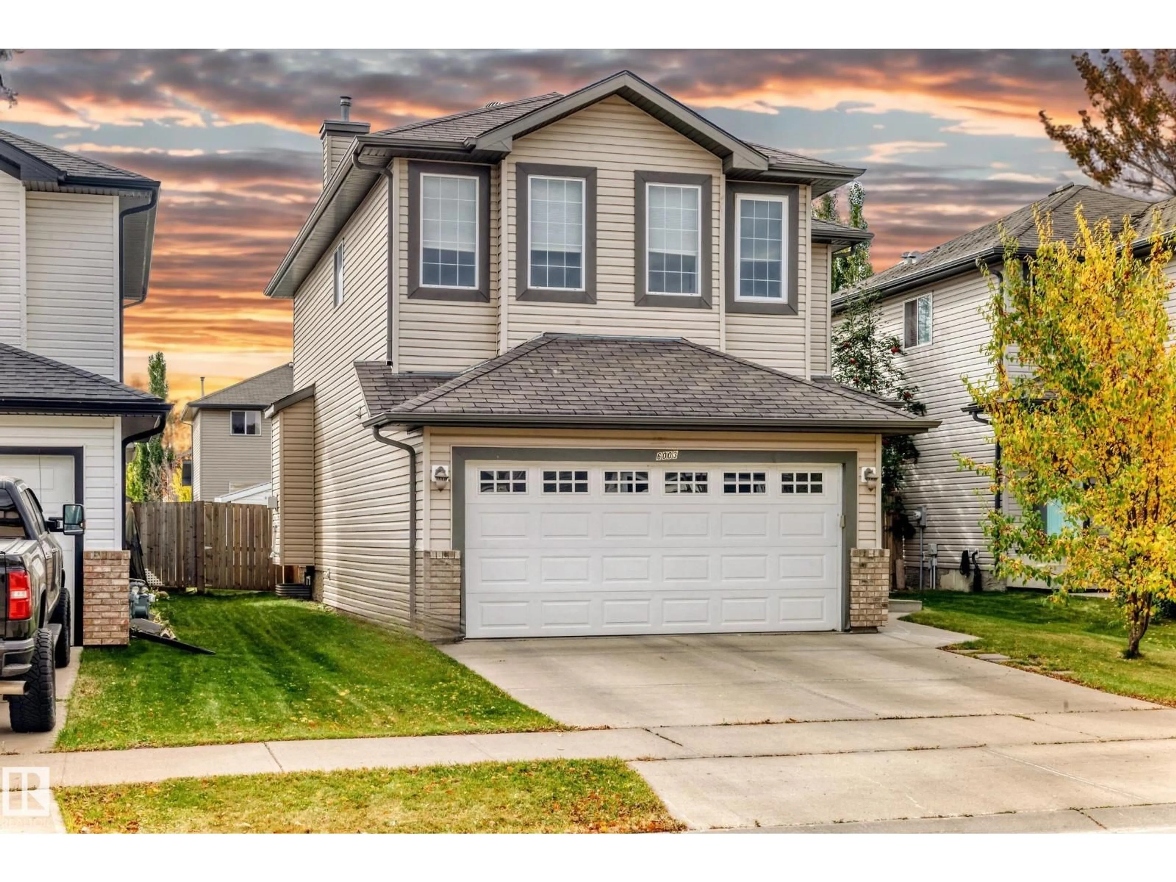 Home with vinyl exterior material, street for 6003 48 AV, Beaumont Alberta T4X0A3