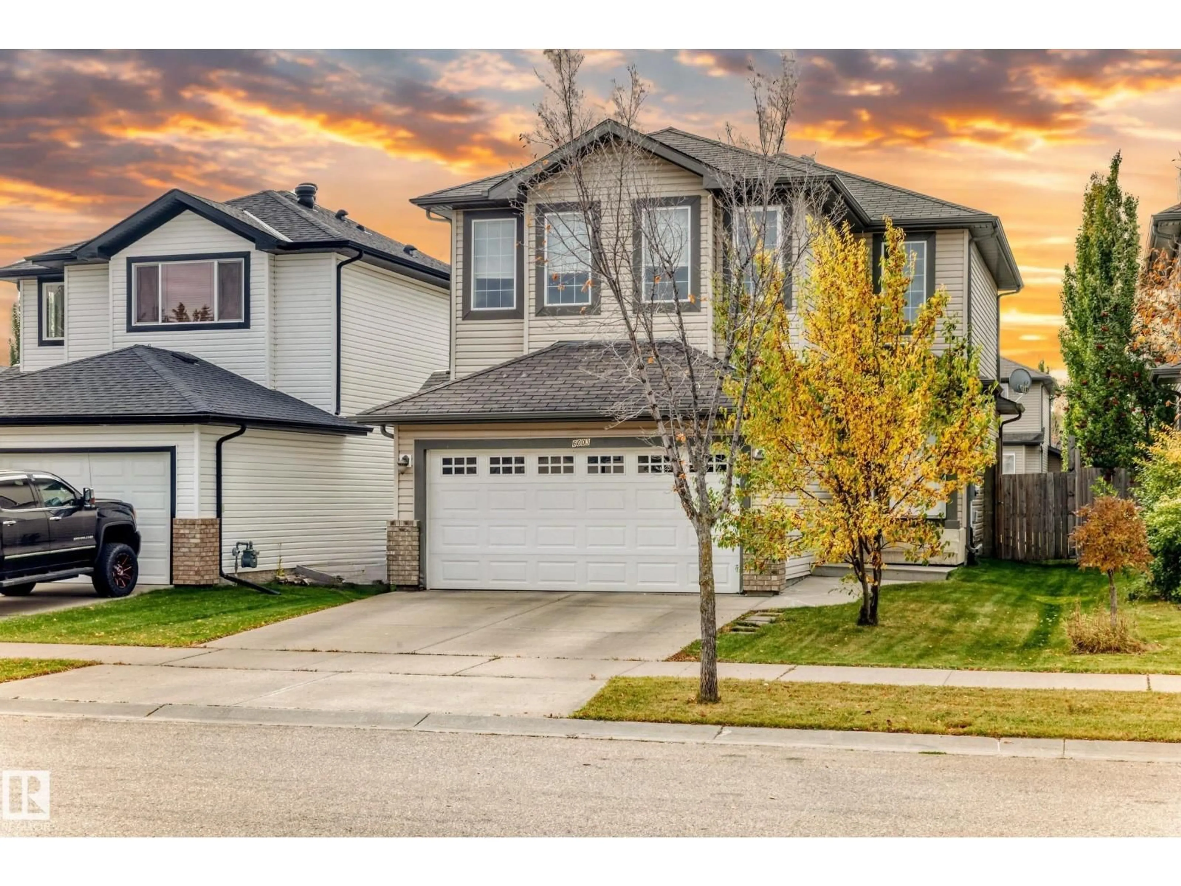 Home with vinyl exterior material, street for 6003 48 AV, Beaumont Alberta T4X0A3