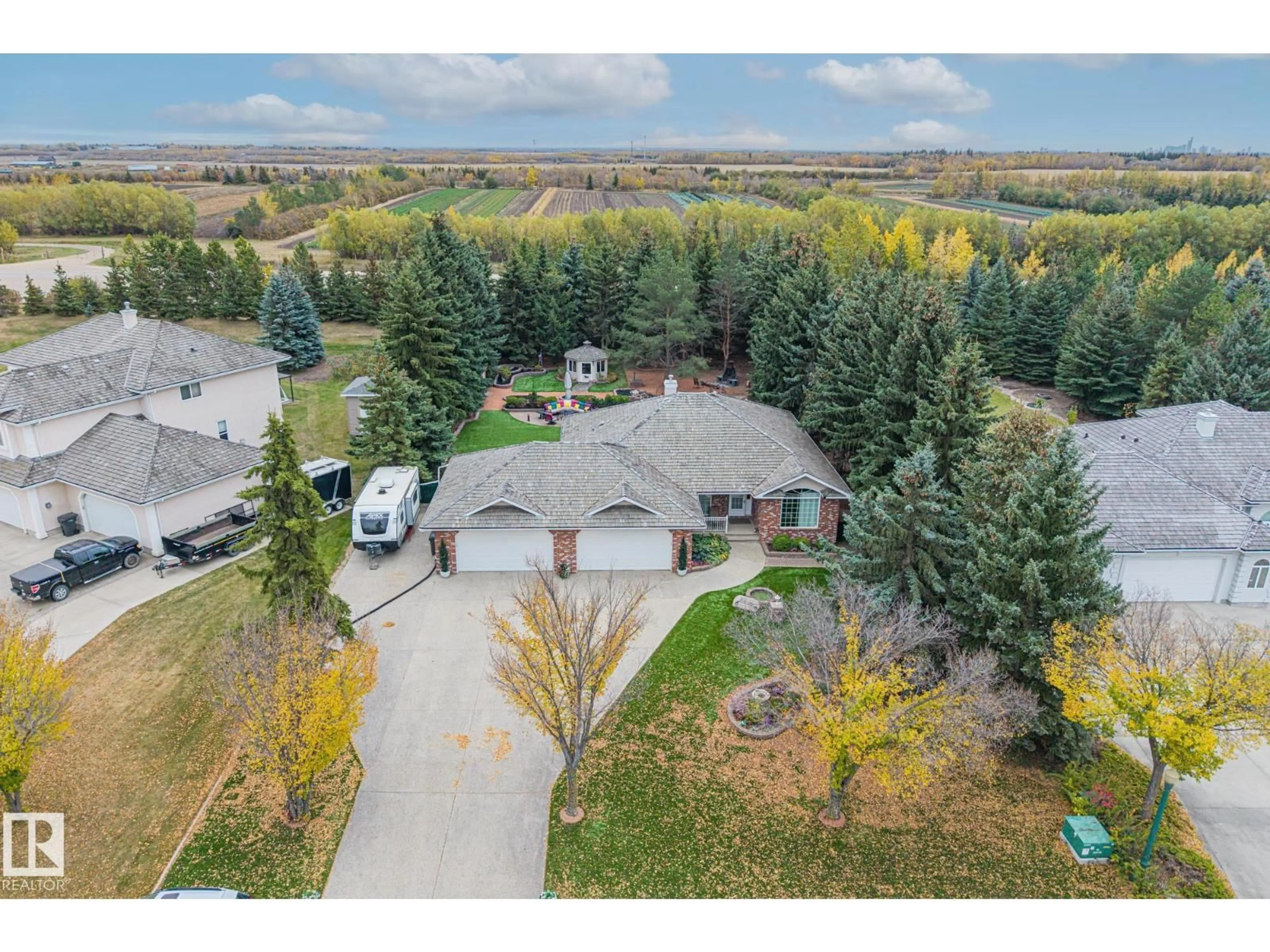 A pic from outside/outdoor area/front of a property/back of a property/a pic from drone, unknown for #41 - 24528 STURGEON RD, Rural Sturgeon County Alberta T8T0A1