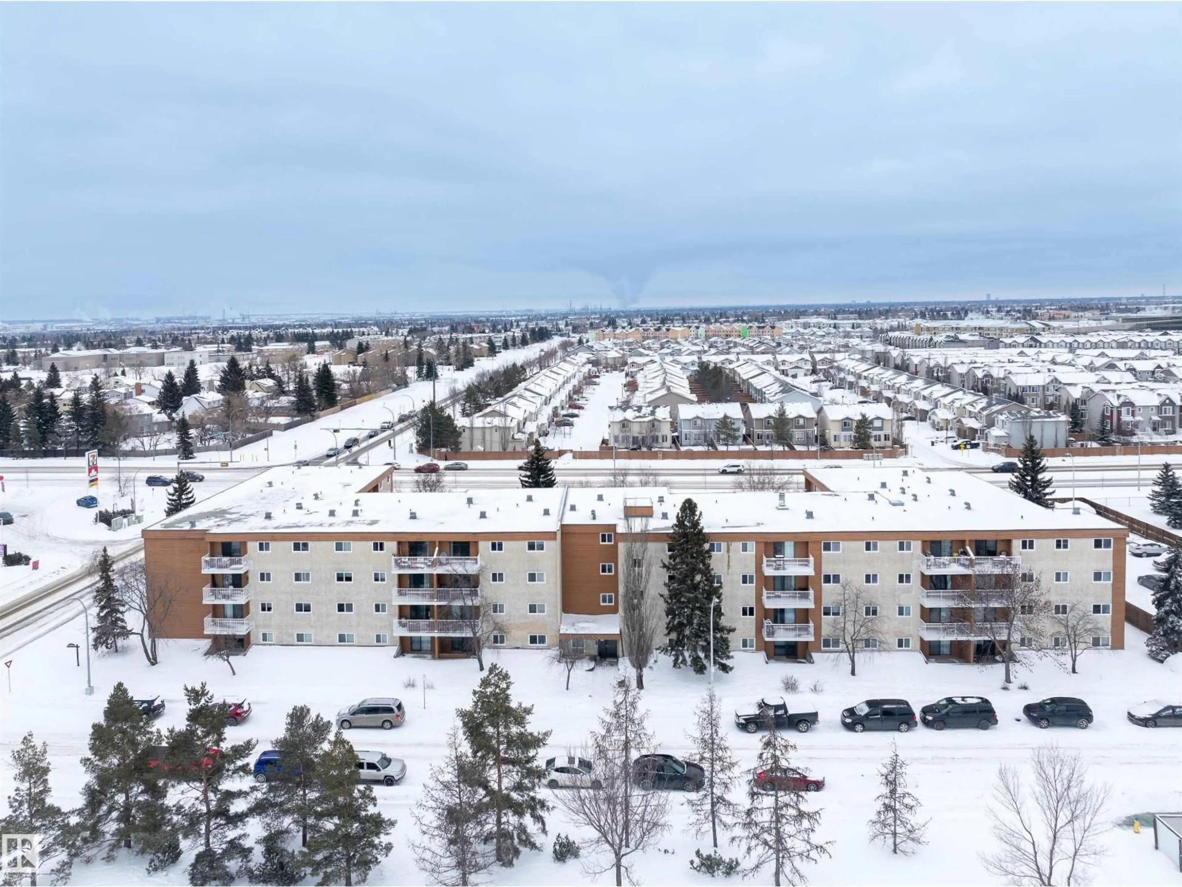 A pic from outside/outdoor area/front of a property/back of a property/a pic from drone, unknown for #401 - 3611 145 AV, Edmonton Alberta T5Y2L7