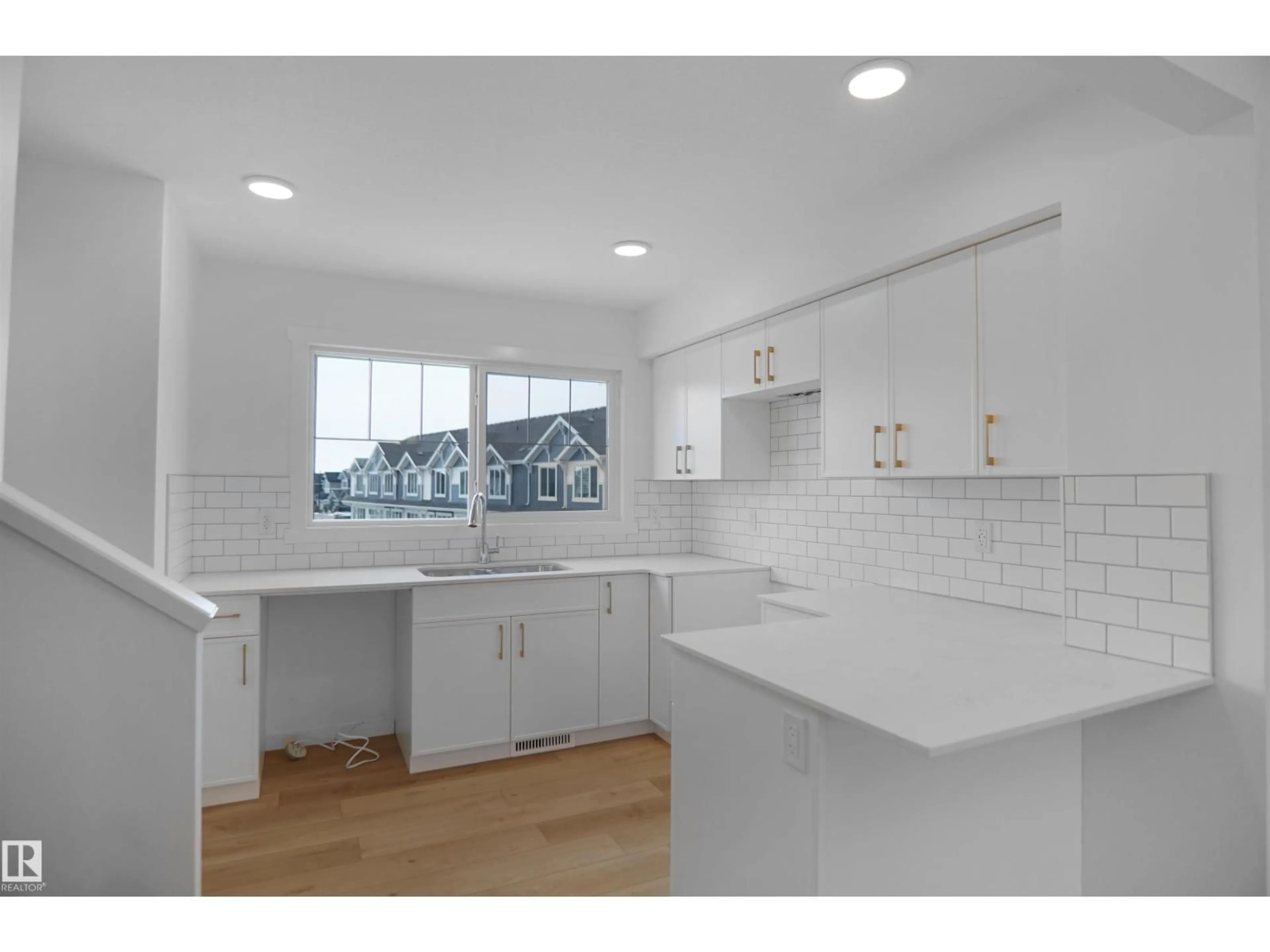 Open concept kitchen, ceramic/tile floor for 1429 9 ST, Edmonton Alberta T6T2N8